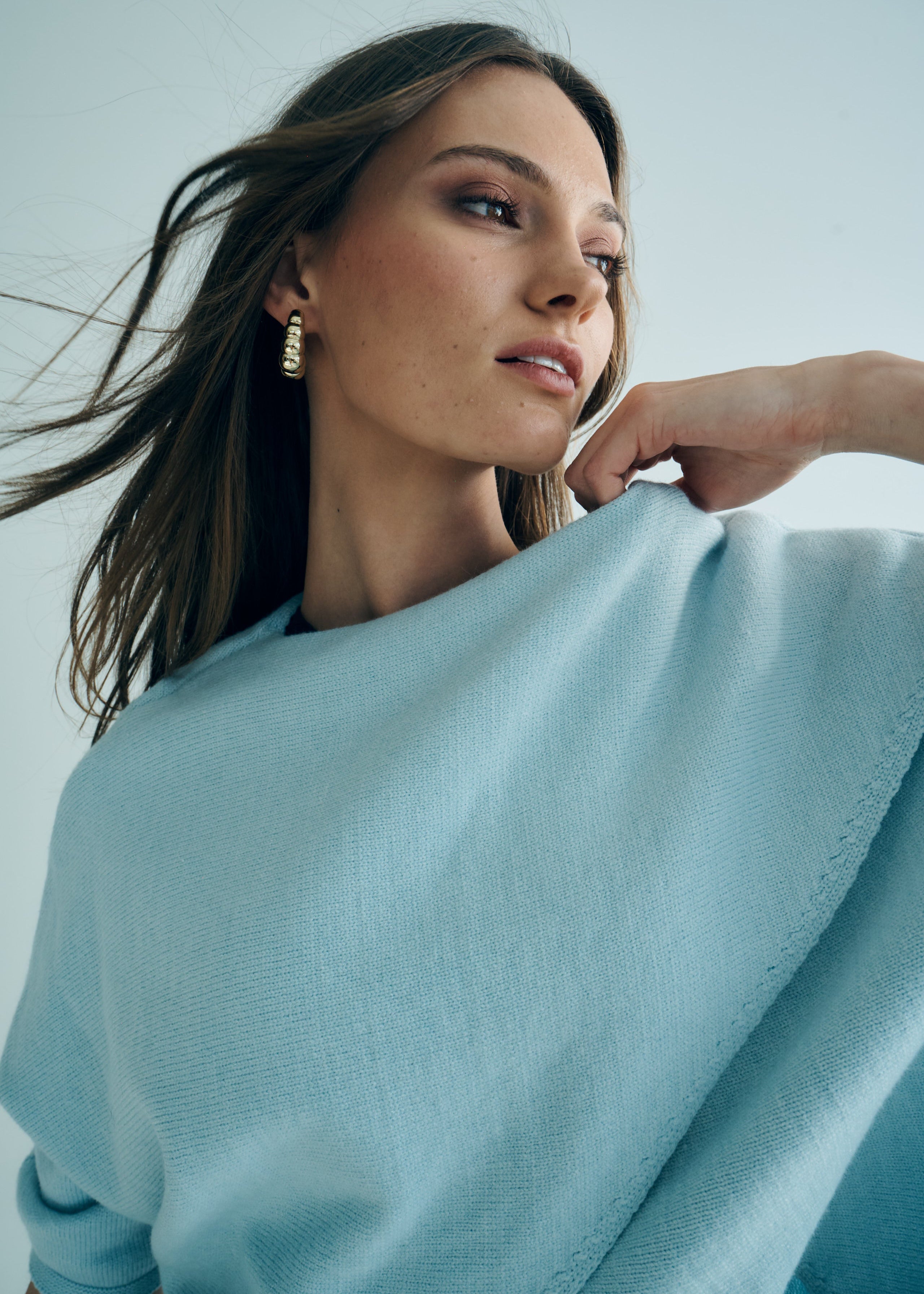 Hygge Italian Viscose Criss Cross Batwing Sleeve Knit In Light Blue