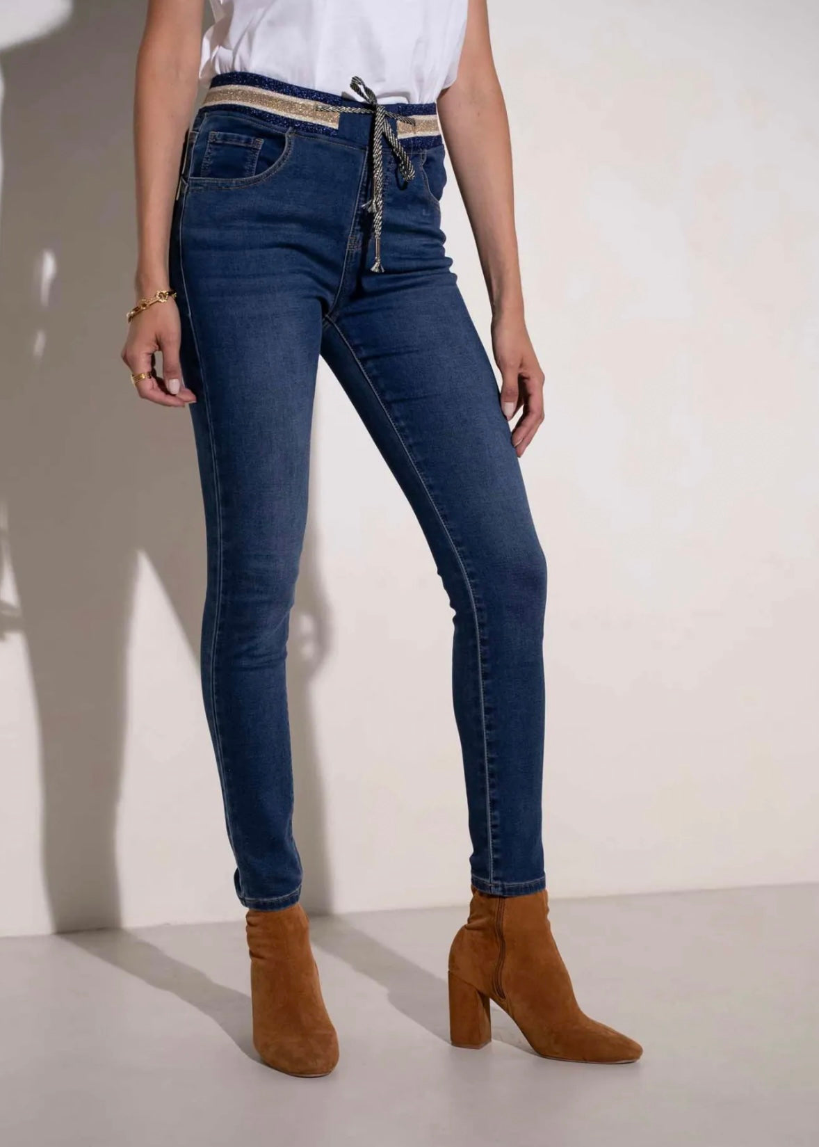 Mid-Rise Cotton Jogger Jeans in Blue with Gold Waist Band