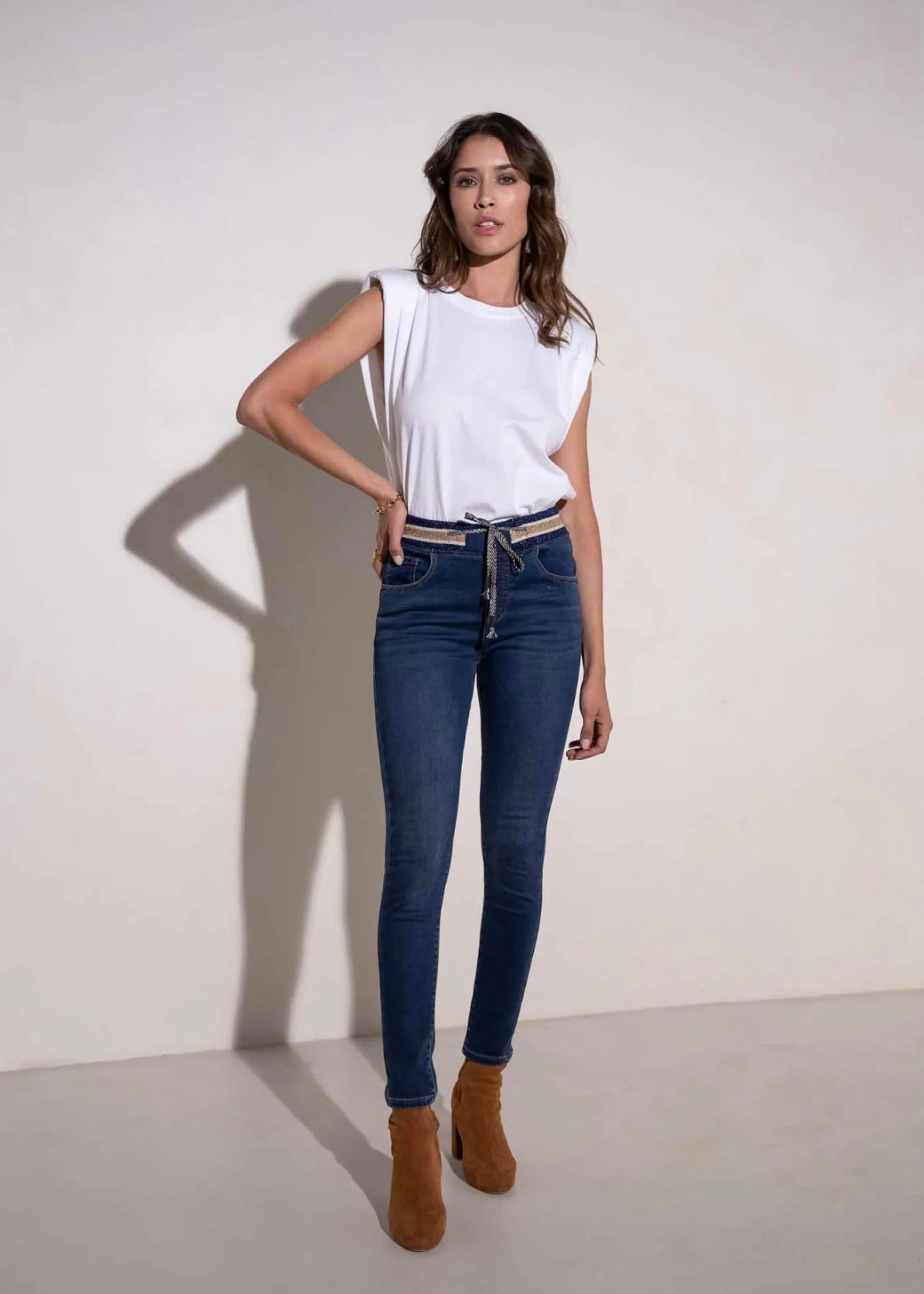 Mid-Rise Cotton Jogger Jeans in Blue with Gold Waist Band