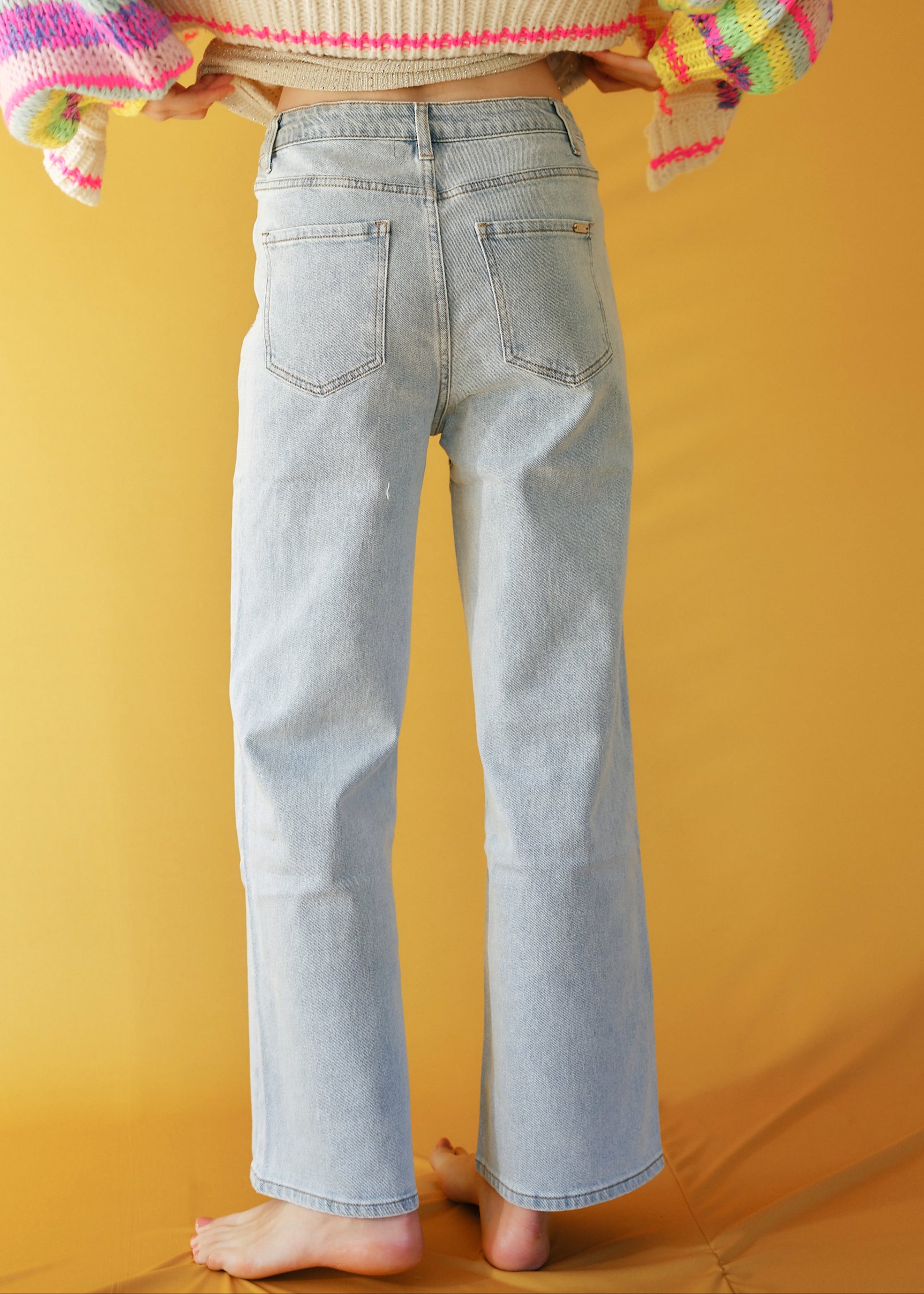 Faded Light Blue Jeans with Plait Detail