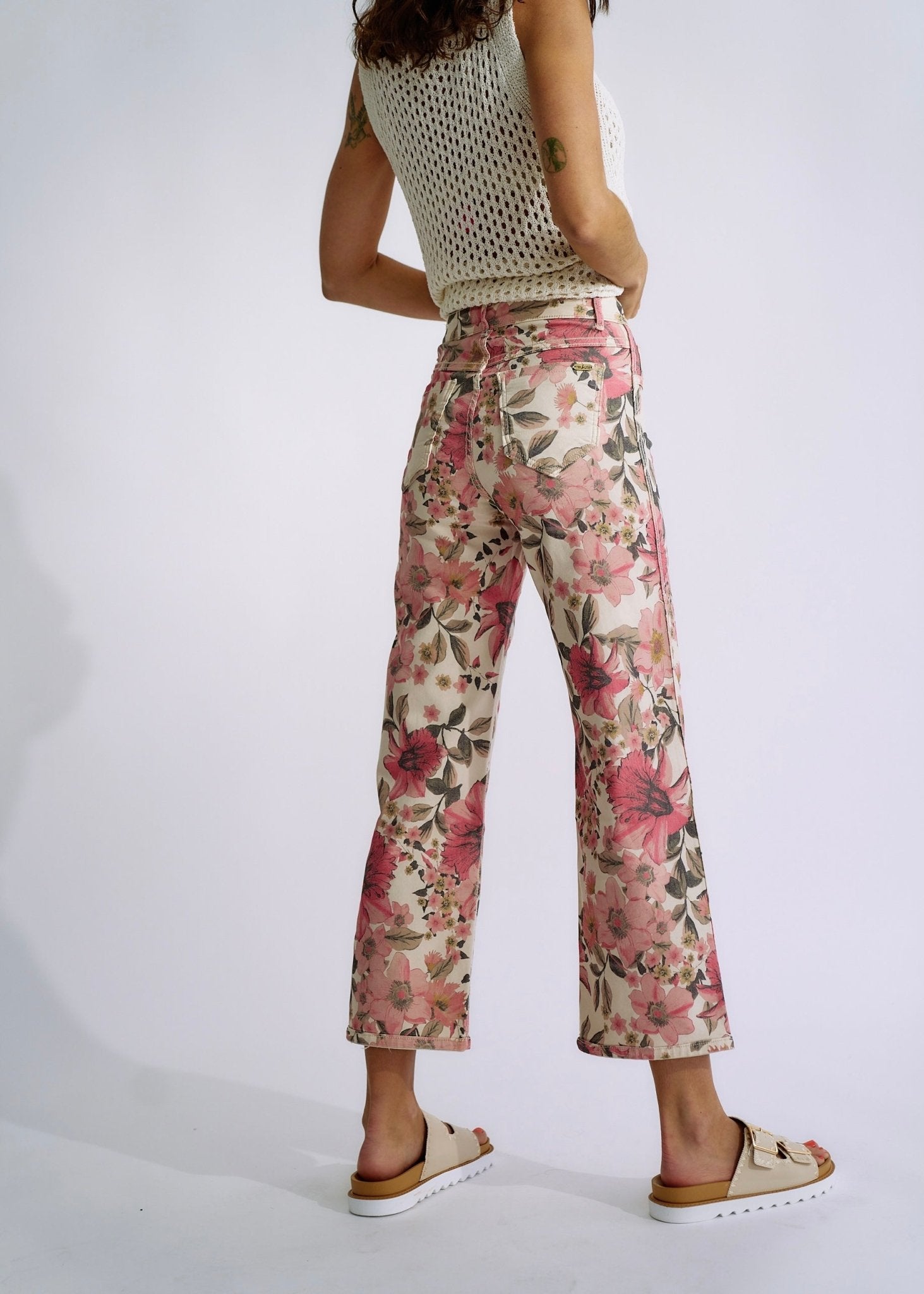 View our Flared and Cropped Reversible Jeans with Summer Print in Beige - The ultimate BOTTOMS created by TRIBUTE and sold here, at Tribute Store