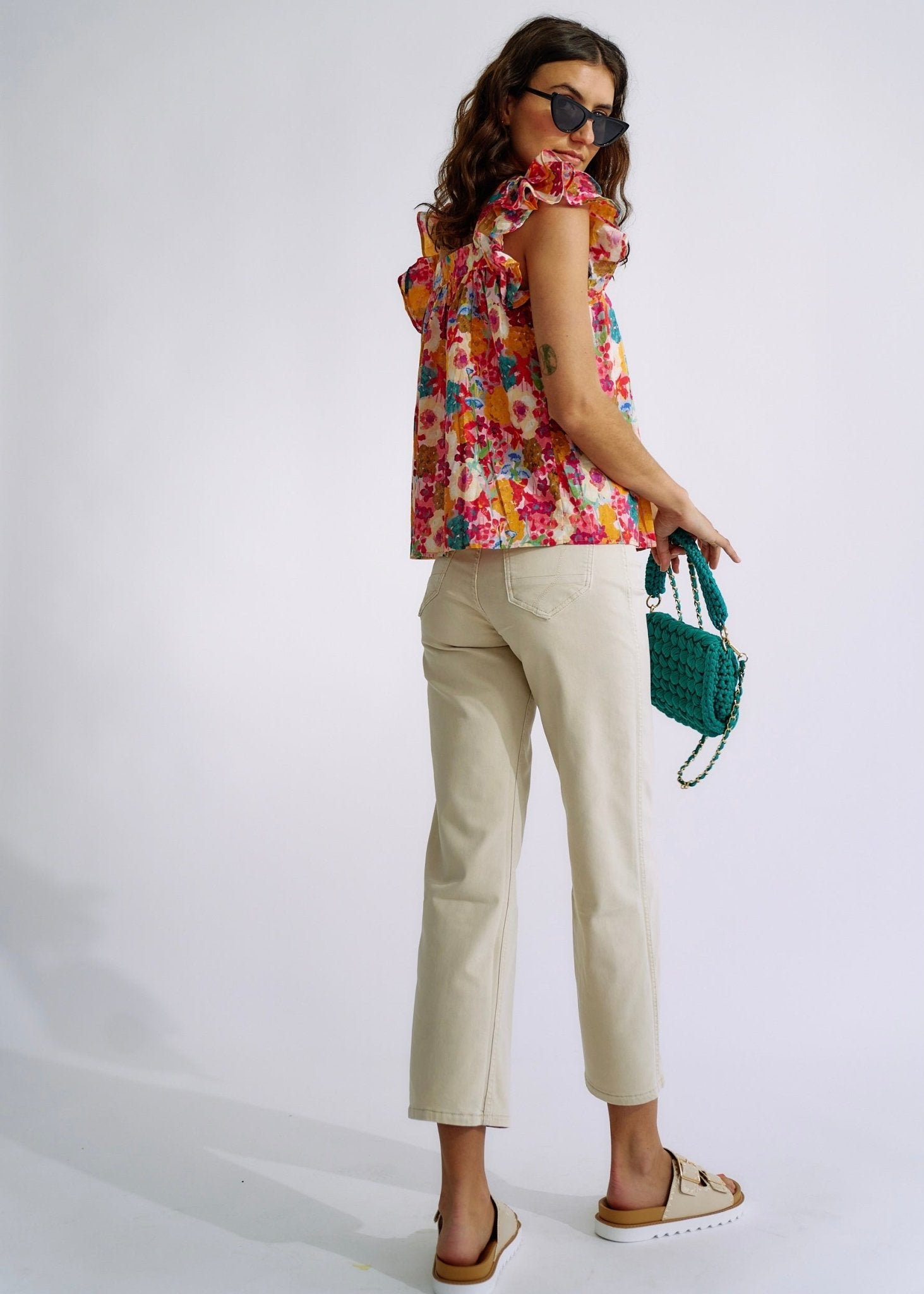 View our Flared and Cropped Reversible Jeans with Summer Print in Beige - The ultimate BOTTOMS created by TRIBUTE and sold here, at Tribute Store