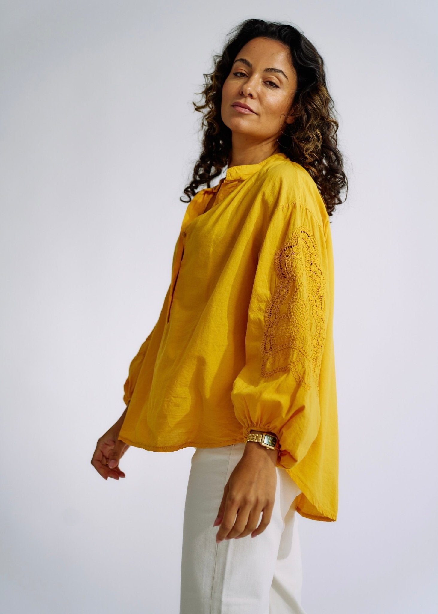 View our Italian Cotton Blouse with Embroidered Sleeves in Mustard - The ultimate TOPS created by TRIBUTE and sold here, at Tribute Store