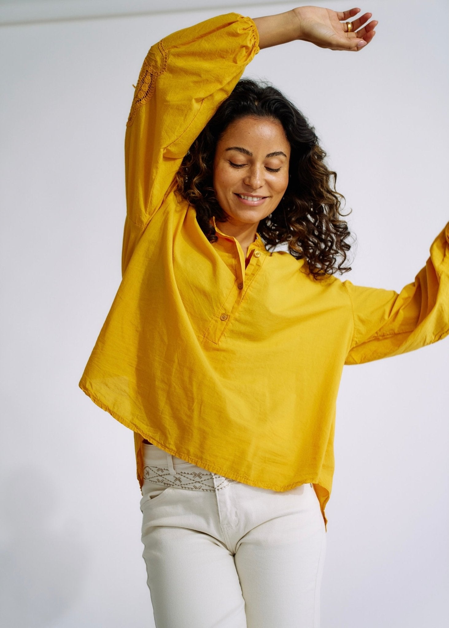 View our Italian Cotton Blouse with Embroidered Sleeves in Mustard - The ultimate TOPS created by TRIBUTE and sold here, at Tribute Store