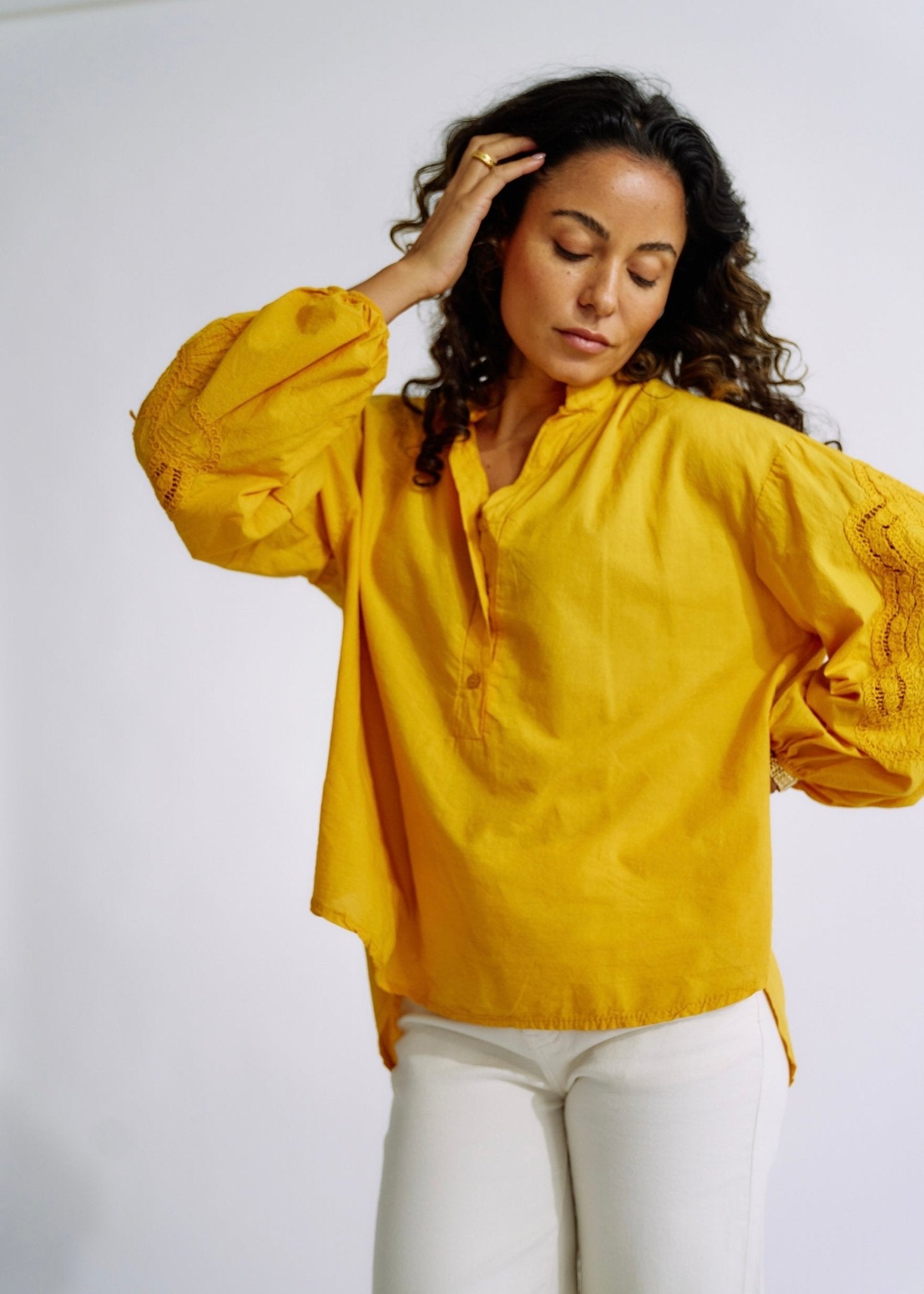 View our Italian Cotton Blouse with Embroidered Sleeves in Mustard - The ultimate TOPS created by TRIBUTE and sold here, at Tribute Store