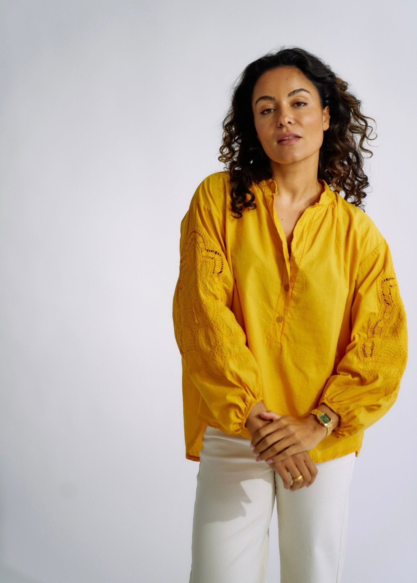 View our Italian Cotton Blouse with Embroidered Sleeves in Mustard - The ultimate TOPS created by TRIBUTE and sold here, at Tribute Store