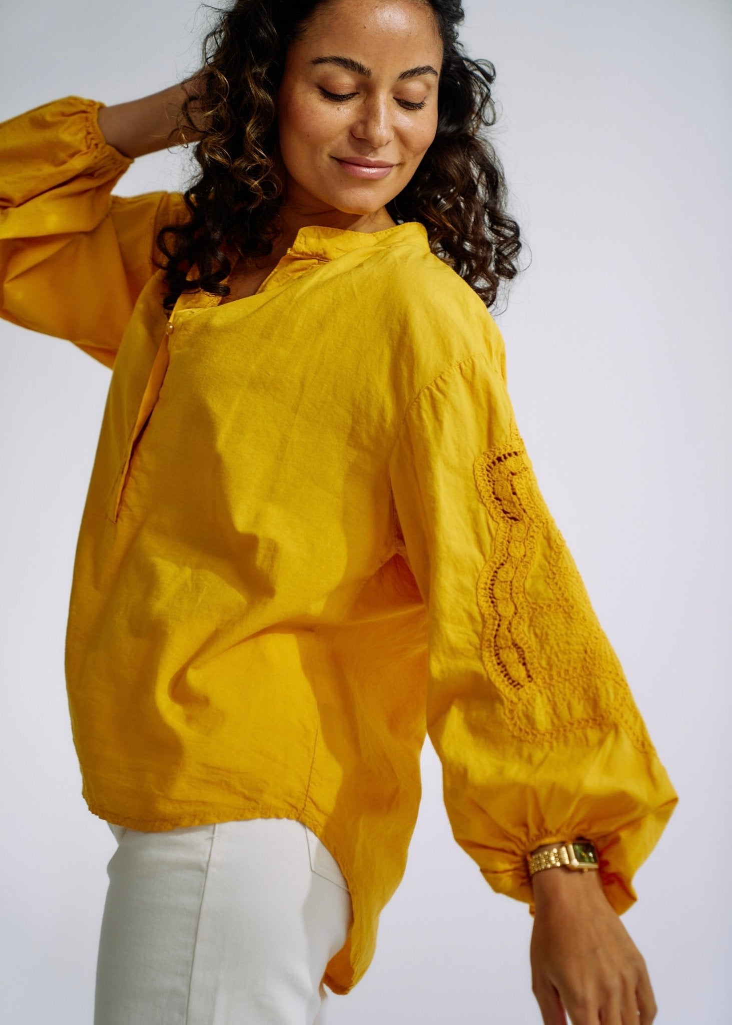 View our Italian Cotton Blouse with Embroidered Sleeves in Mustard - The ultimate TOPS created by TRIBUTE and sold here, at Tribute Store