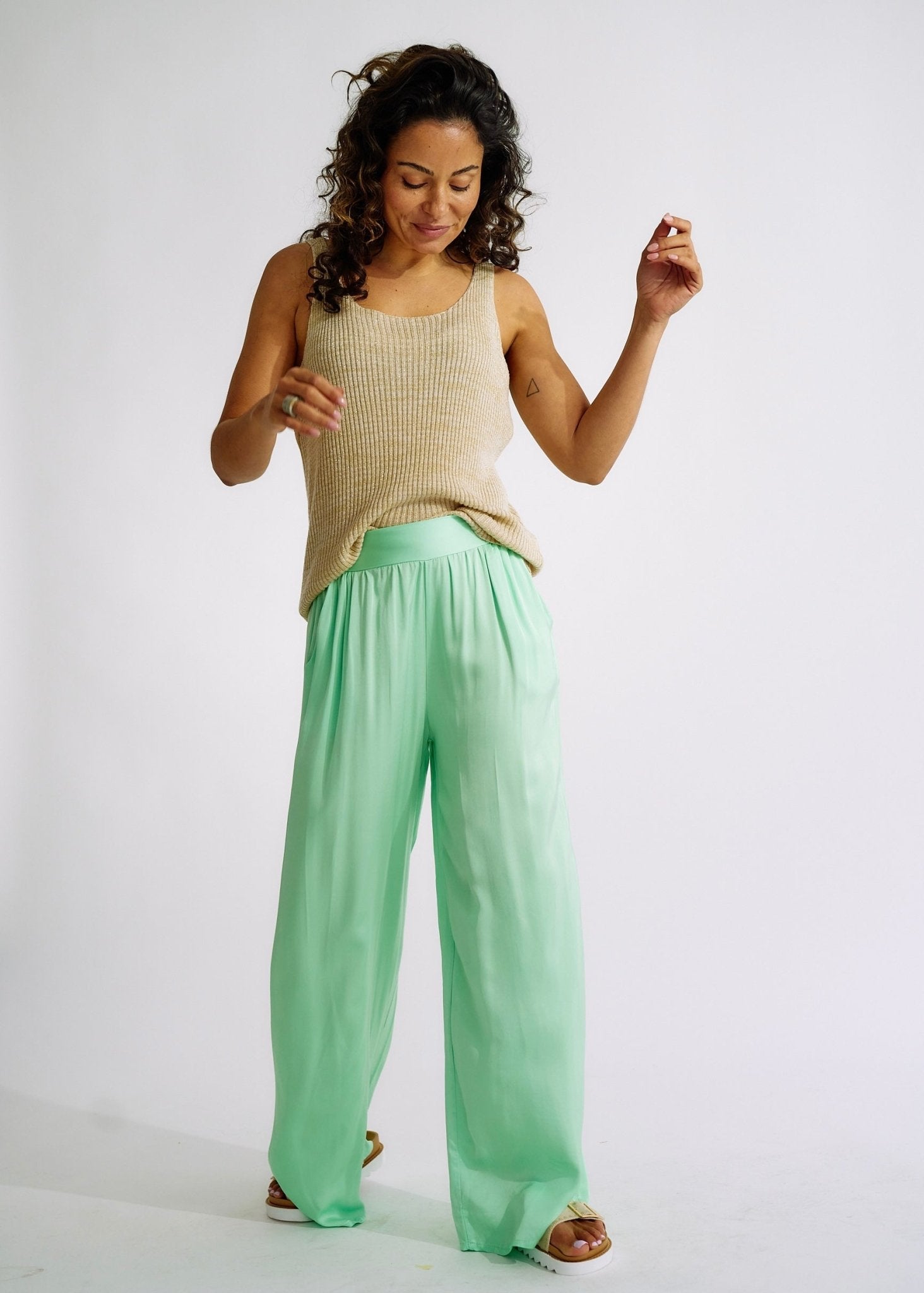 View our Italian Satin Palazzo Pants Green - The ultimate BOTTOMS created by TRIBUTE and sold here, at Tribute Store