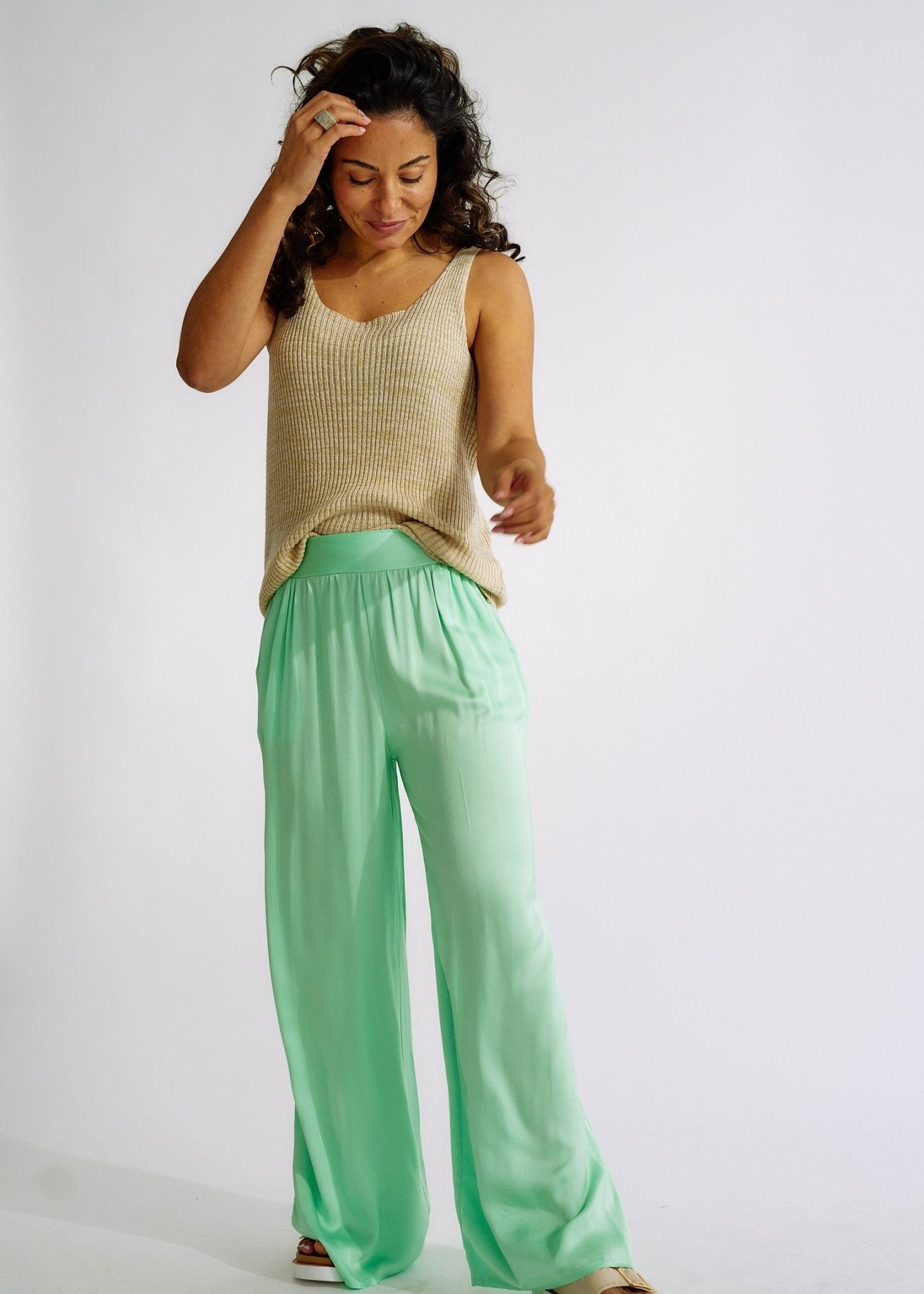View our Italian Satin Palazzo Pants Green - The ultimate BOTTOMS created by TRIBUTE and sold here, at Tribute Store