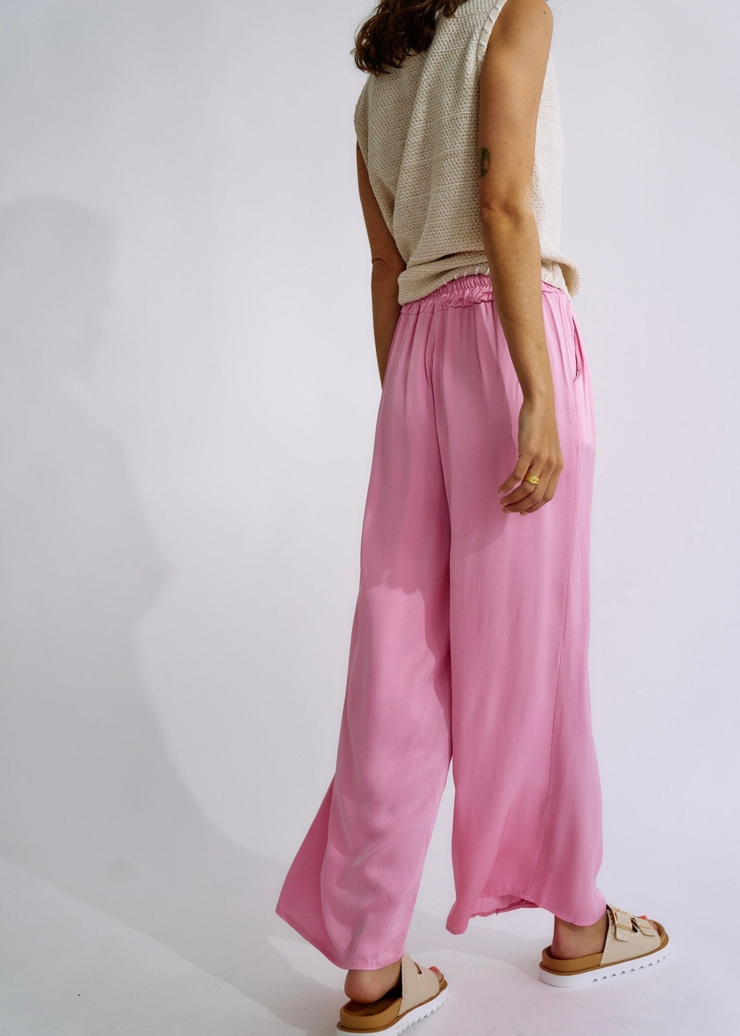 View our Italian Satin Palazzo Pants in Soft Pink - The ultimate BOTTOMS created by TRIBUTE and sold here, at Tribute Store