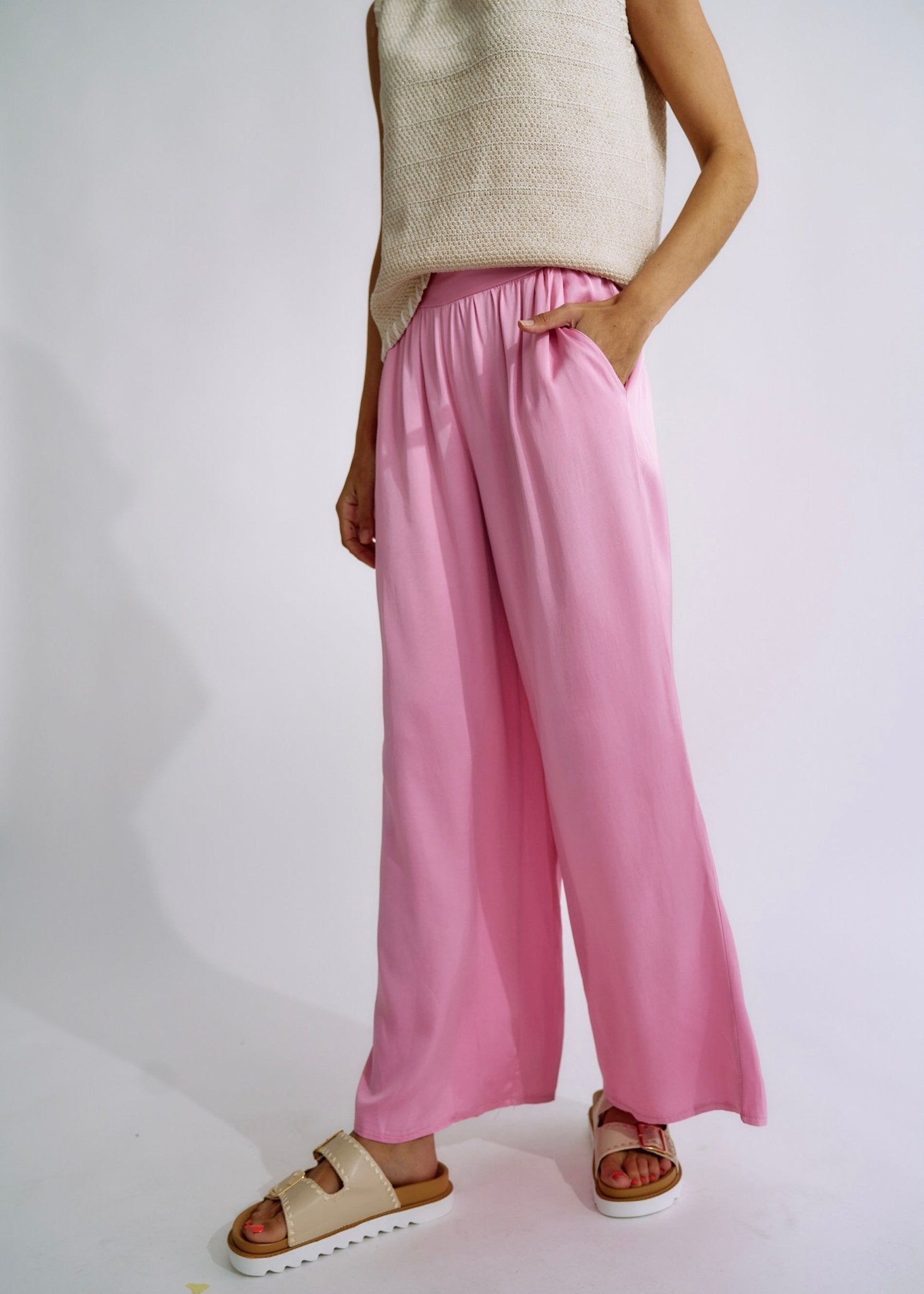 View our Italian Satin Palazzo Pants in Soft Pink - The ultimate BOTTOMS created by TRIBUTE and sold here, at Tribute Store