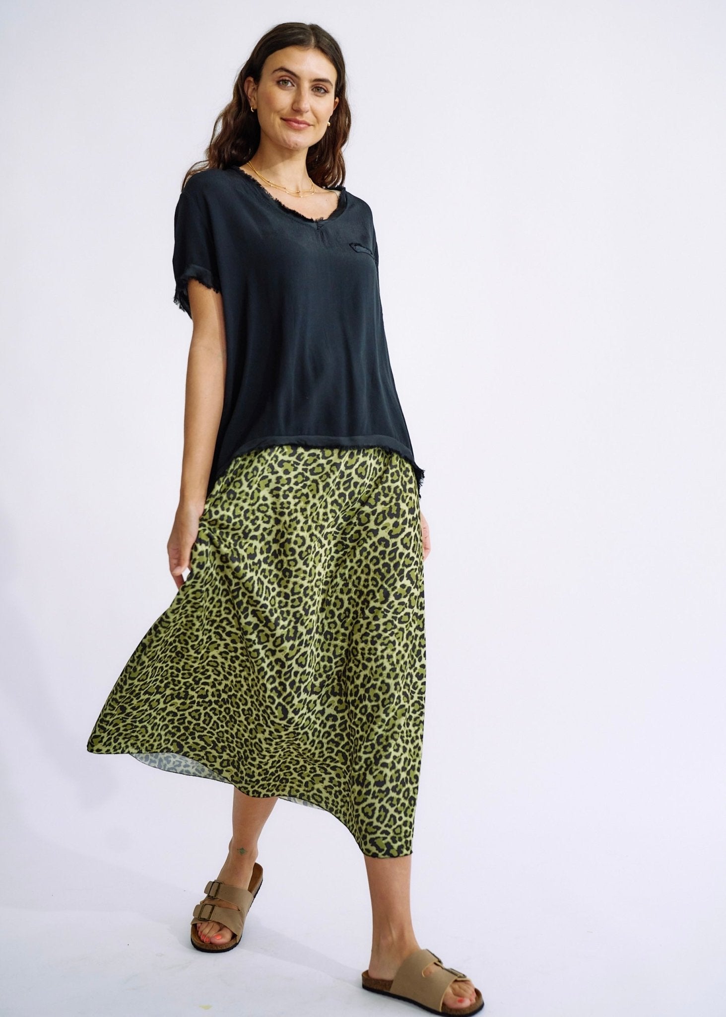 View our Italian Satin Skirt in Green Leopard Print - The ultimate BOTTOMS created by TRIBUTE and sold here, at Tribute Store