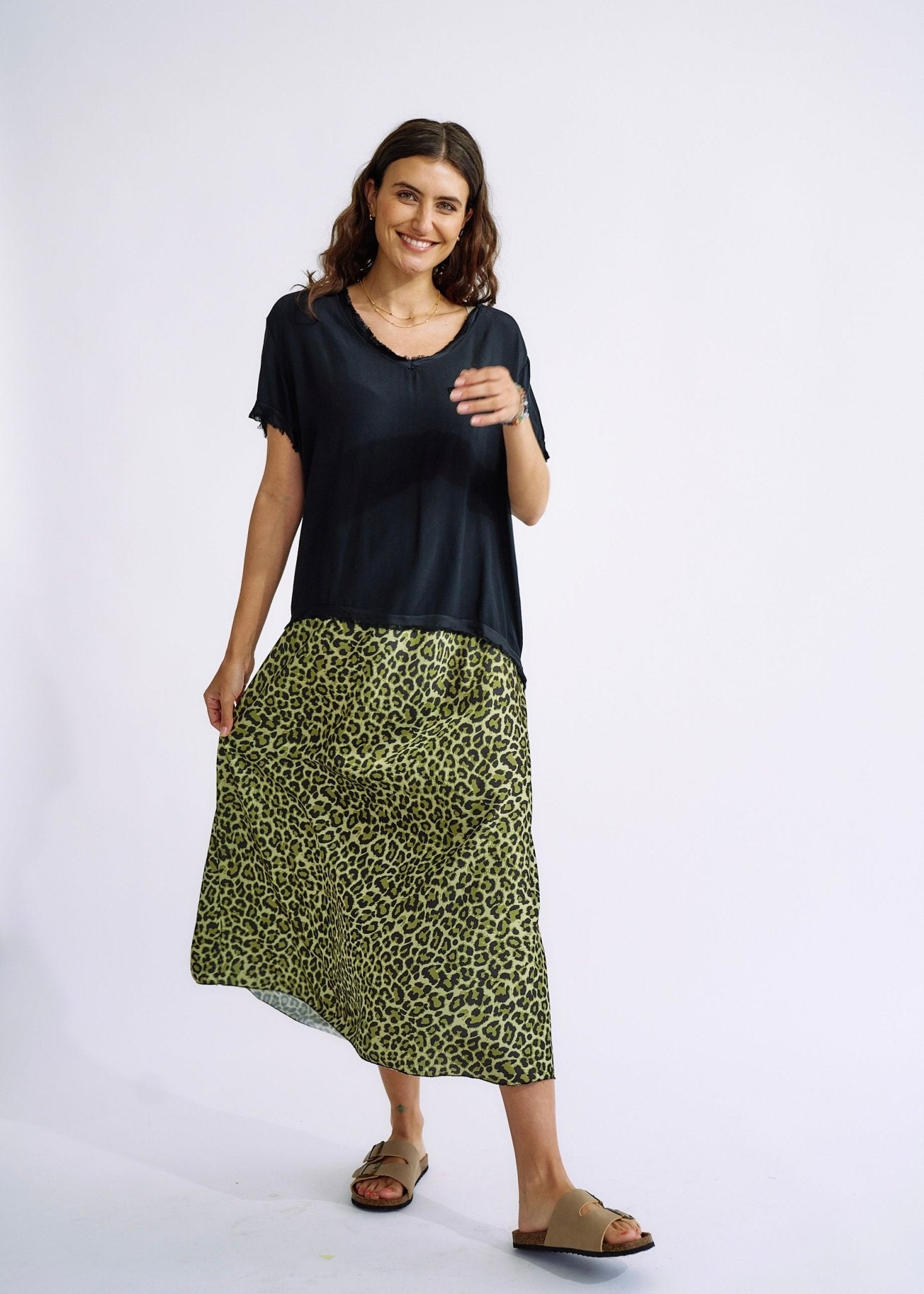 View our Italian Satin Skirt in Green Leopard Print - The ultimate BOTTOMS created by TRIBUTE and sold here, at Tribute Store