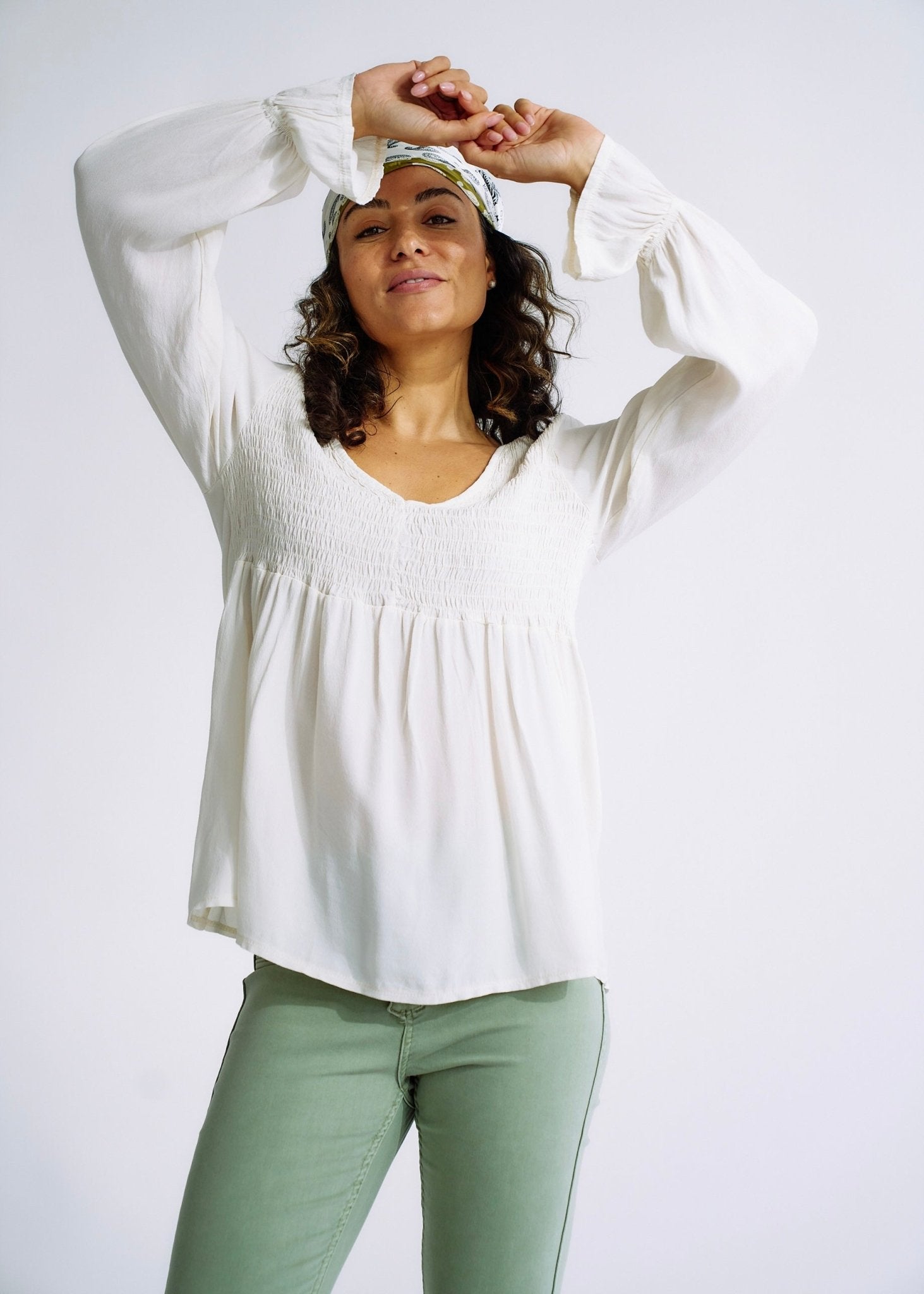 View our Italian Smock V Neck Blouse in Off White - The ultimate TOPS created by TRIBUTE and sold here, at Tribute Store