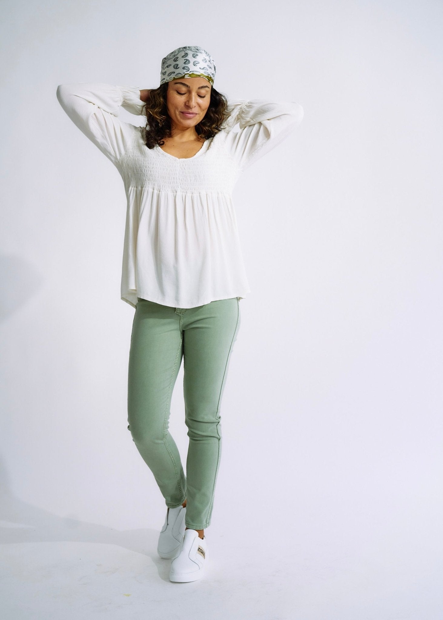 View our Italian Smock V Neck Blouse in Off White - The ultimate TOPS created by TRIBUTE and sold here, at Tribute Store