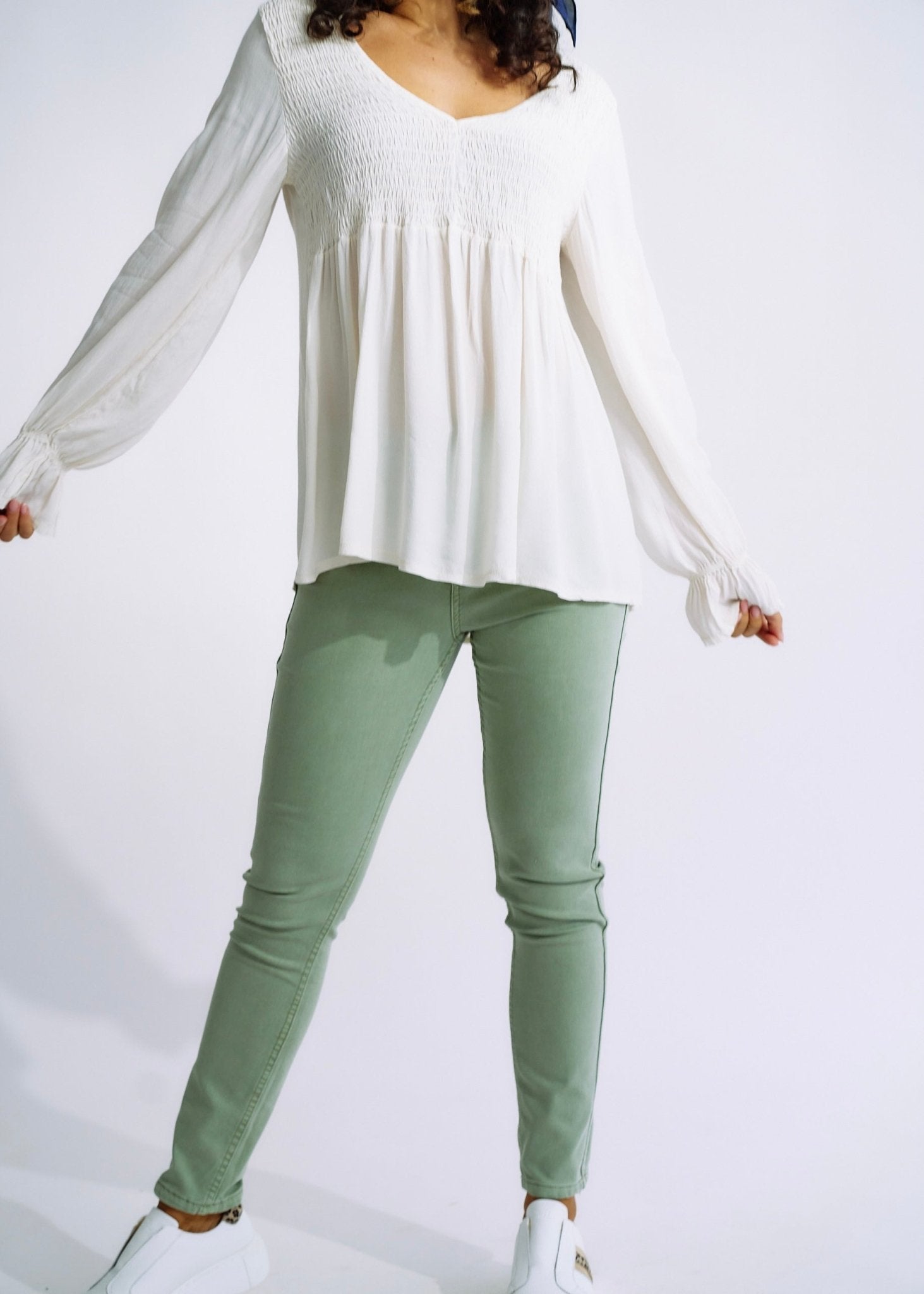 View our Italian Smock V Neck Blouse in Off White - The ultimate TOPS created by TRIBUTE and sold here, at Tribute Store