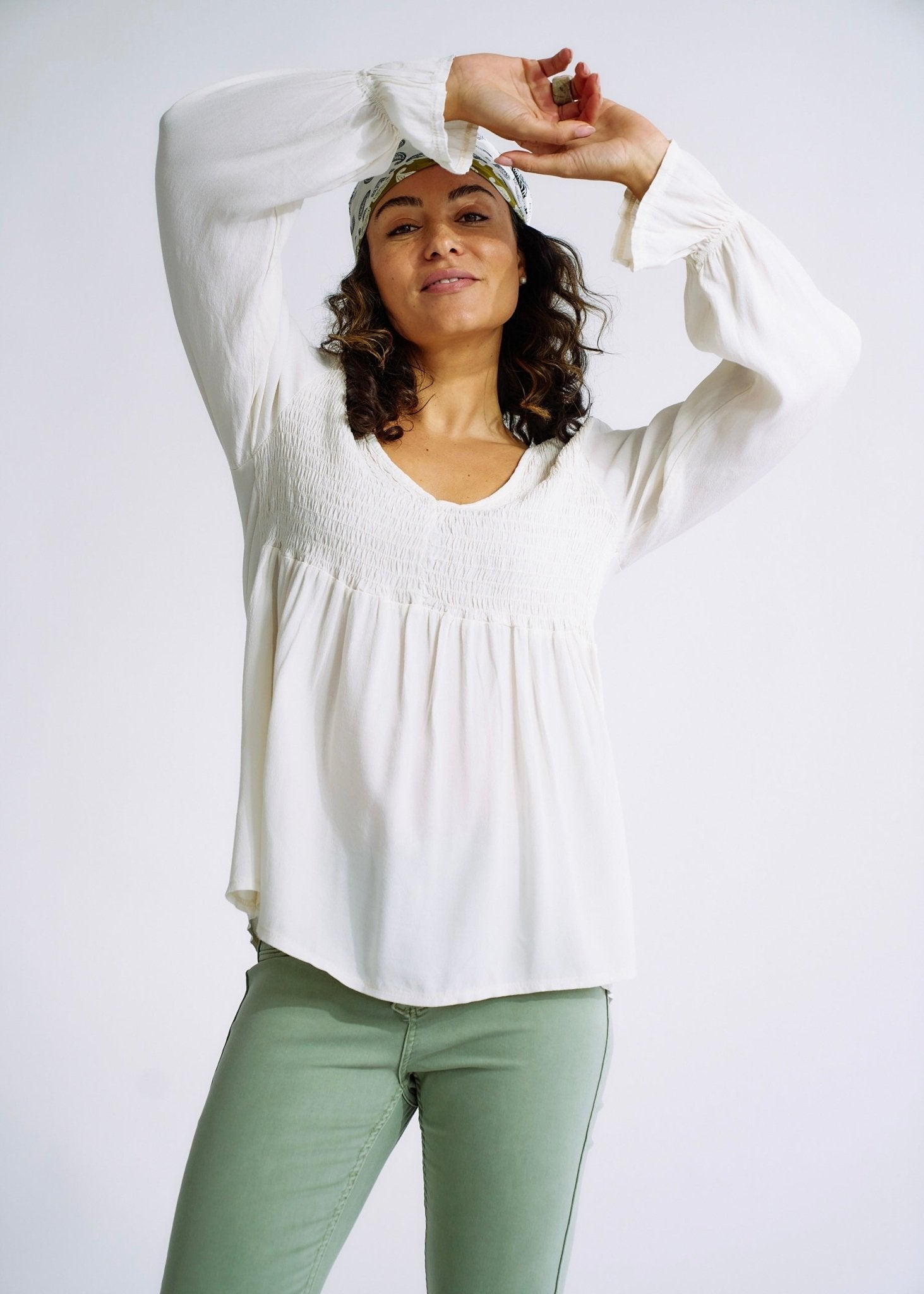 View our Italian Smock V Neck Blouse in Off White - The ultimate TOPS created by TRIBUTE and sold here, at Tribute Store