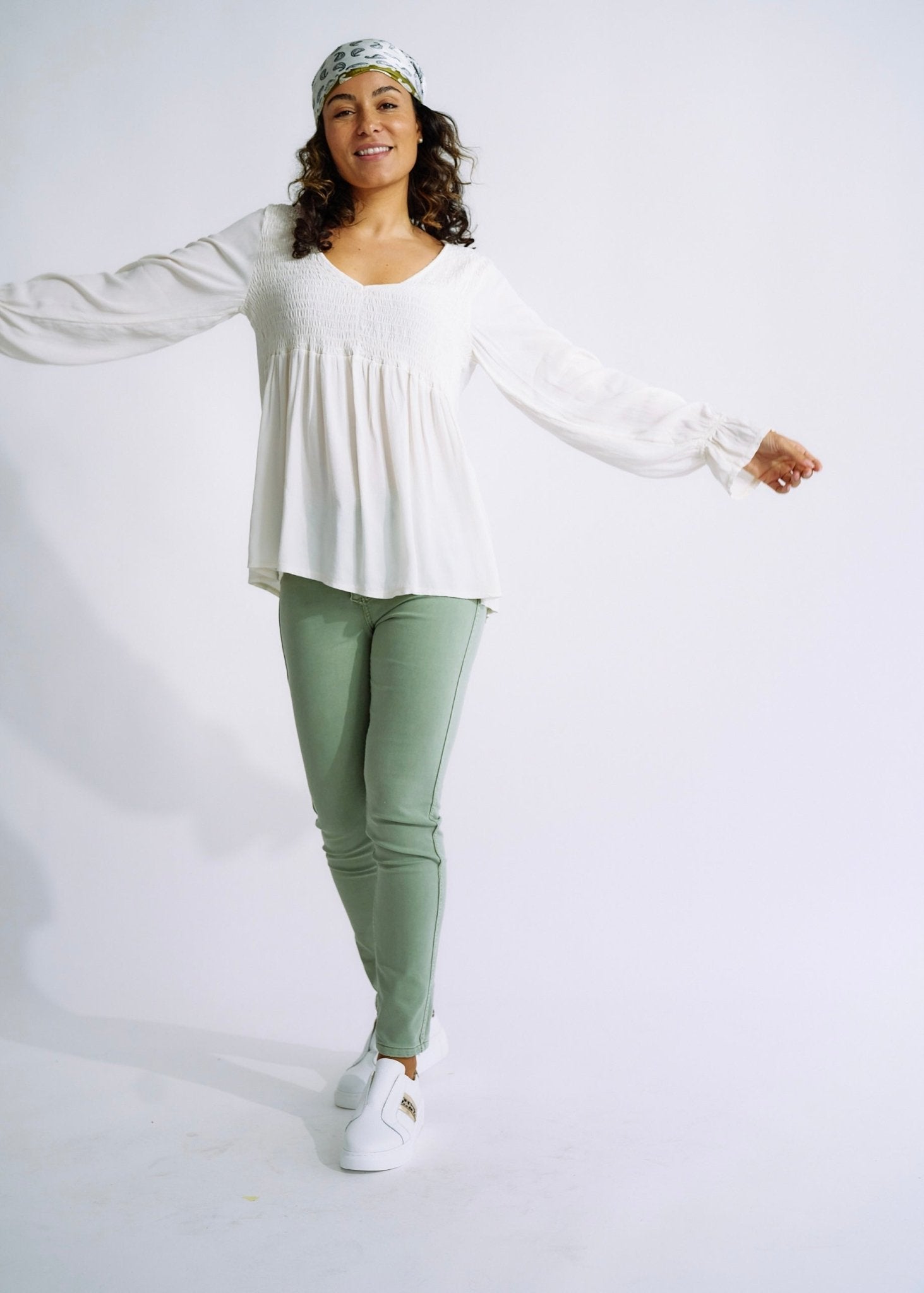 View our Italian Smock V Neck Blouse in Off White - The ultimate TOPS created by TRIBUTE and sold here, at Tribute Store