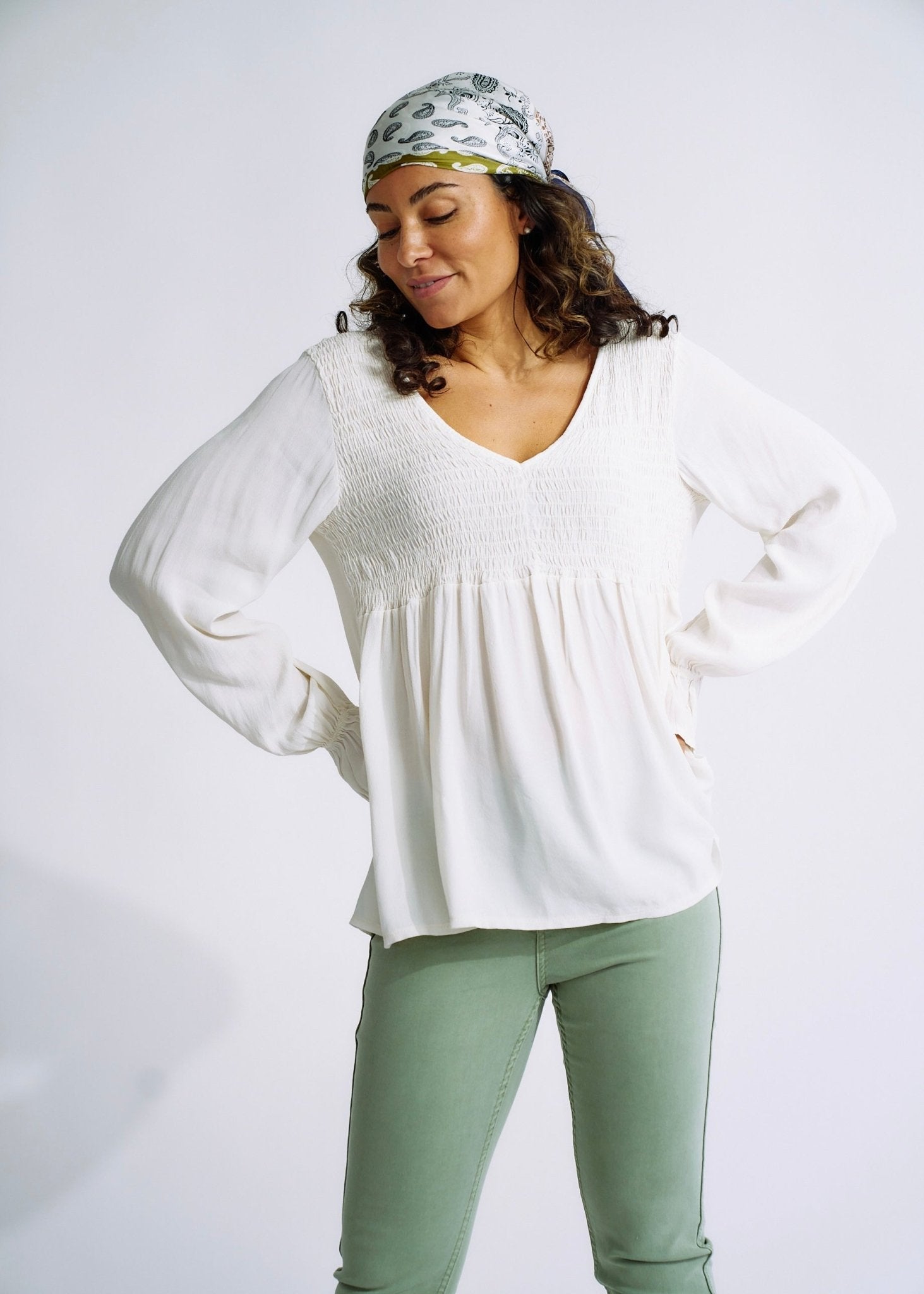 View our Italian Smock V Neck Blouse in Off White - The ultimate TOPS created by TRIBUTE and sold here, at Tribute Store