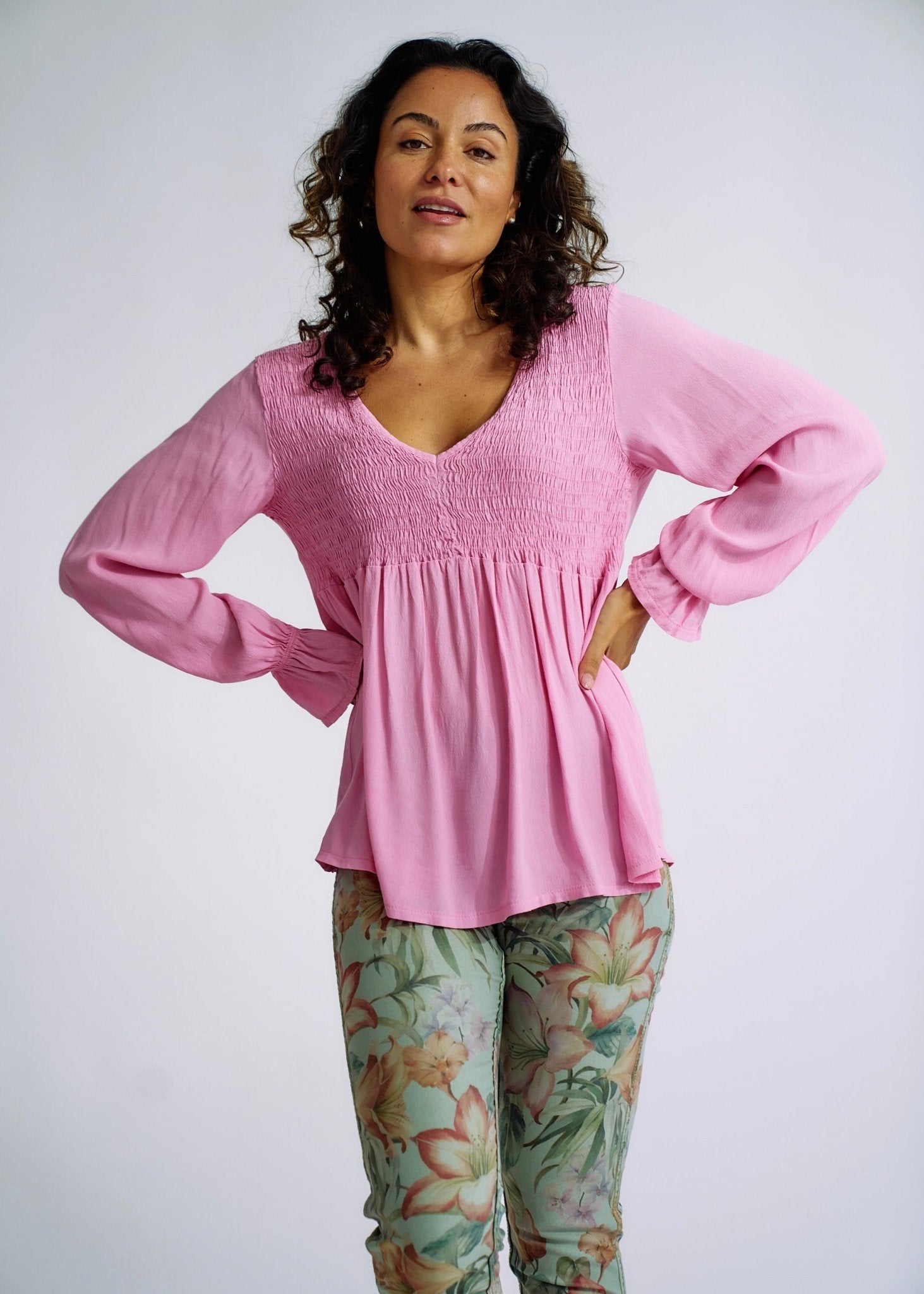 View our Italian Smock V Neck Blouse in Soft Pink - The ultimate TOPS created by TRIBUTE and sold here, at Tribute Store