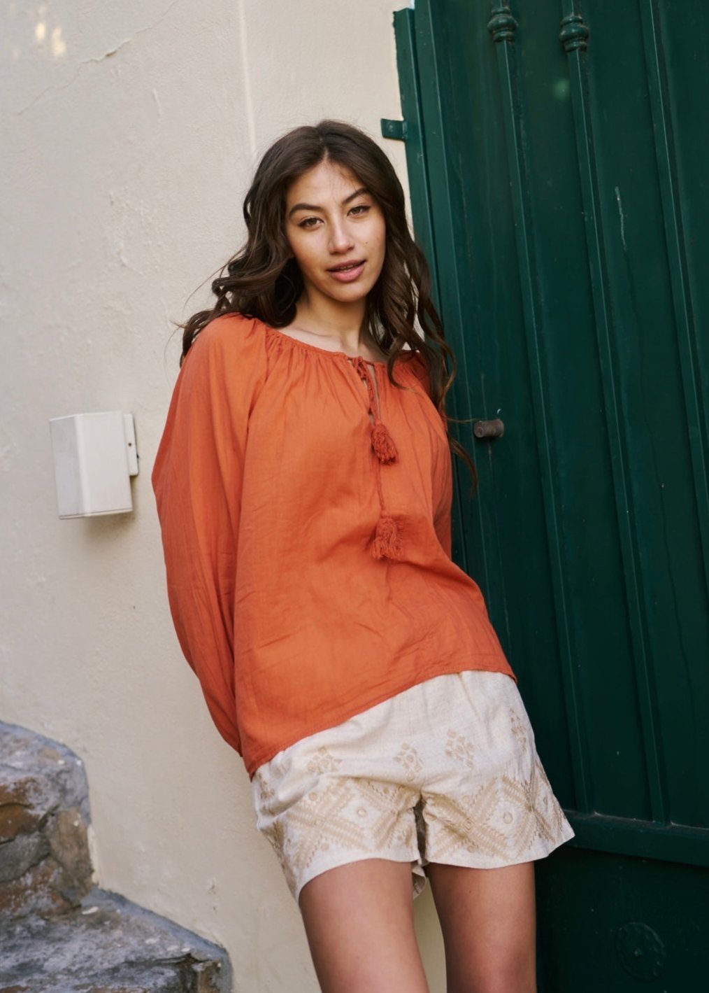View our Italian Stonewashed Peasant Blouse in Rust - The ultimate TOPS created by TRIBUTE and sold here, at Tribute Store