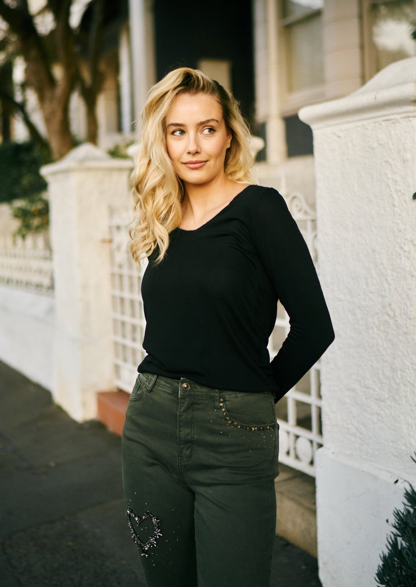 View our Italian V Neck Knit with Shimmer Edge in Black - The ultimate TOPS created by TRIBUTE and sold here, at Tribute Store