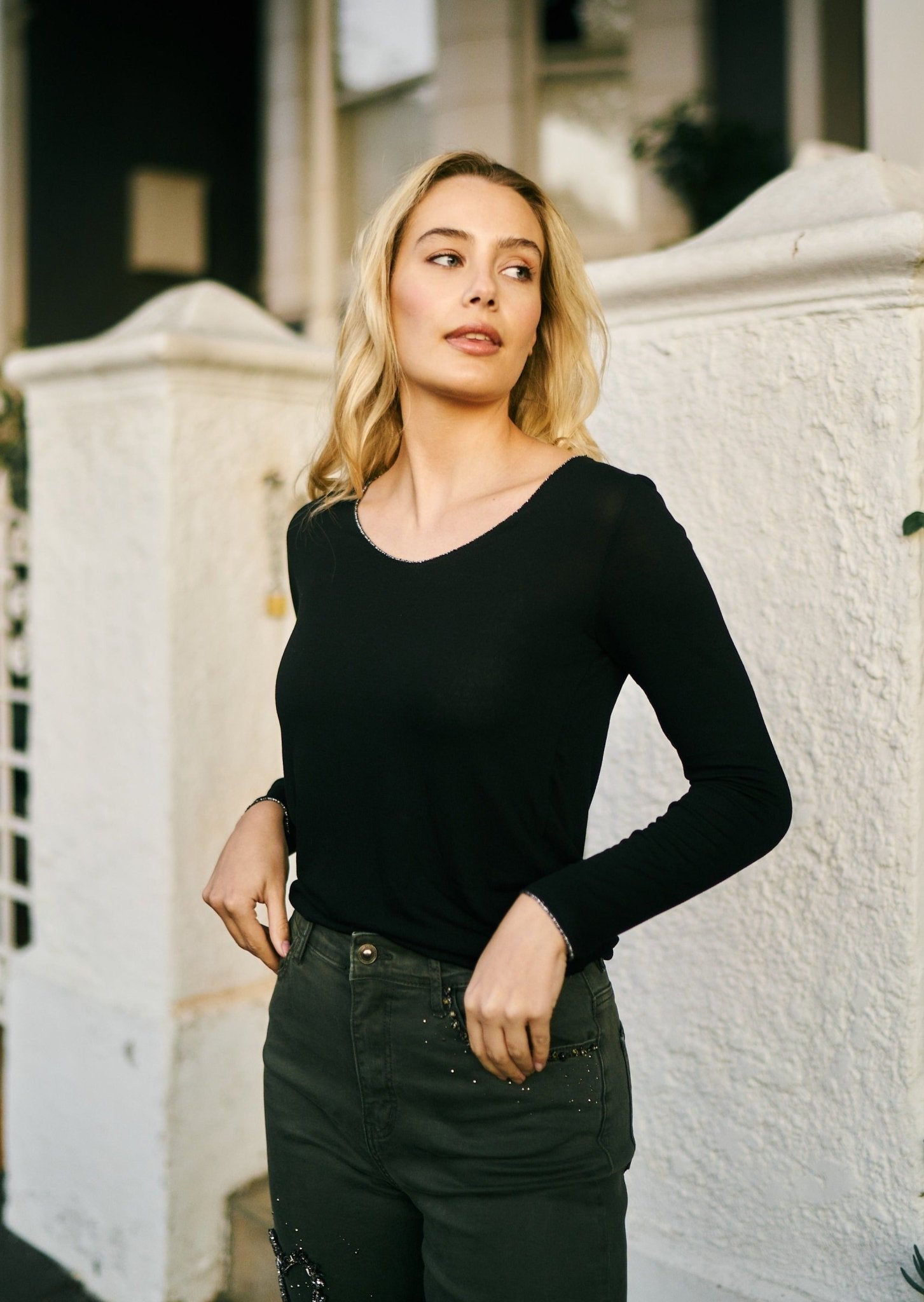 View our Italian V Neck Knit with Shimmer Edge in Black - The ultimate TOPS created by TRIBUTE and sold here, at Tribute Store