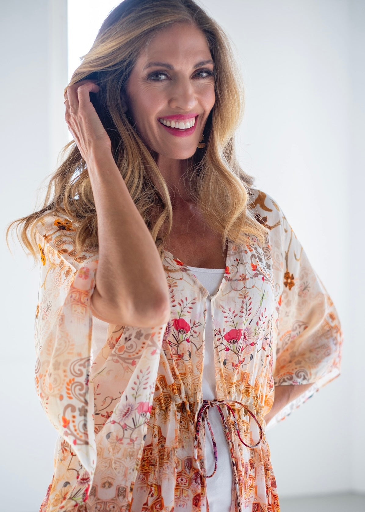 View our Lara Kaftan With Flower Print In Soft Peach - The ultimate DRESSES created by ICONIC and sold here, at Tribute Store