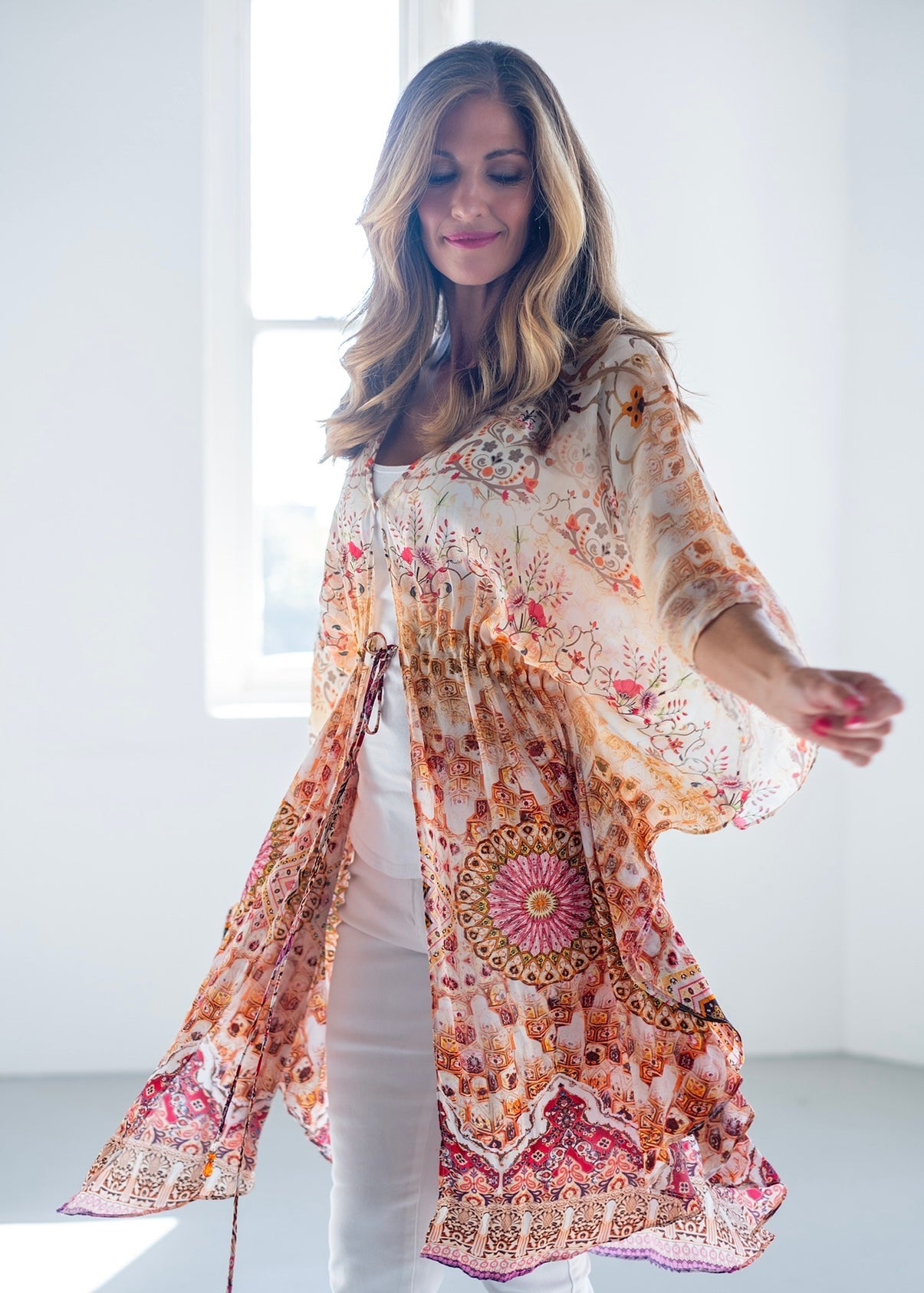 View our Lara Kaftan With Flower Print In Soft Peach - The ultimate DRESSES created by ICONIC and sold here, at Tribute Store