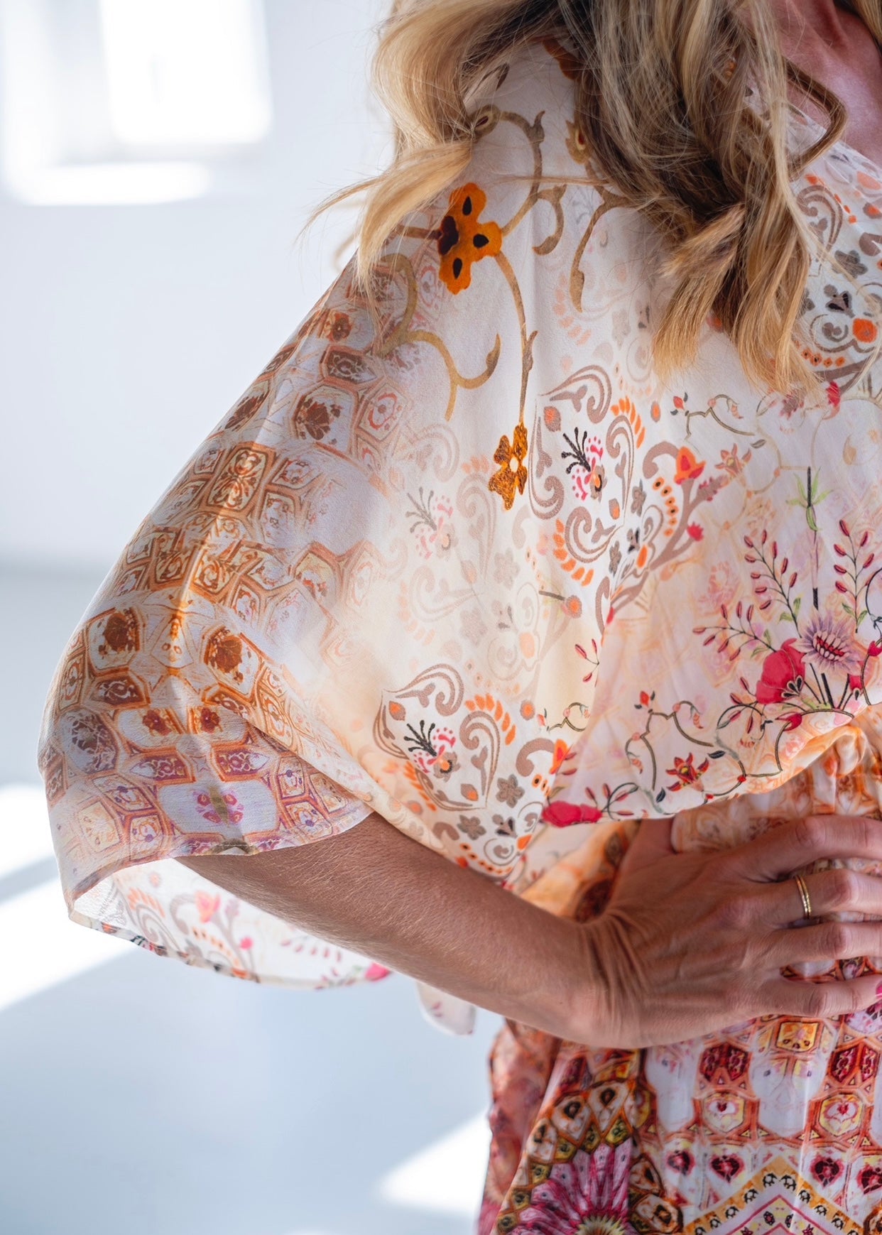 View our Lara Kaftan With Flower Print In Soft Peach - The ultimate DRESSES created by ICONIC and sold here, at Tribute Store