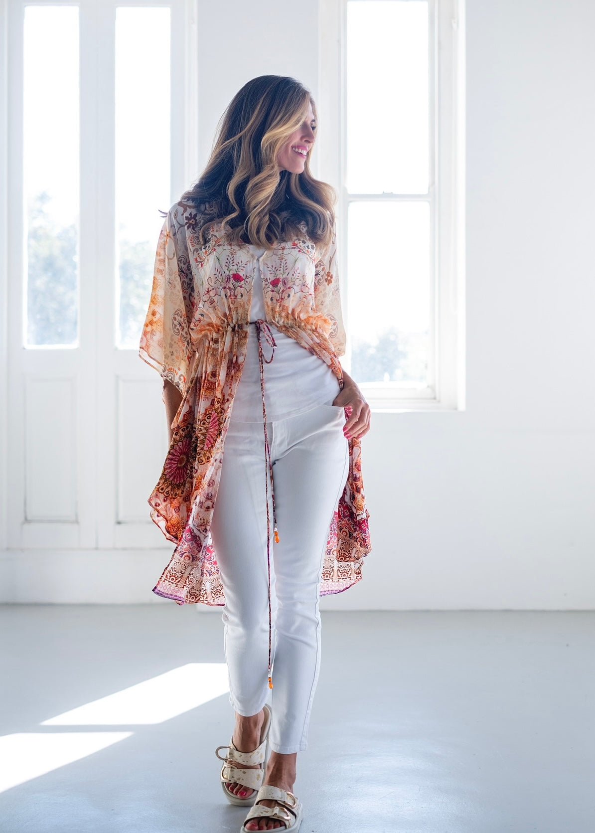 View our Lara Kaftan With Flower Print In Soft Peach - The ultimate DRESSES created by ICONIC and sold here, at Tribute Store