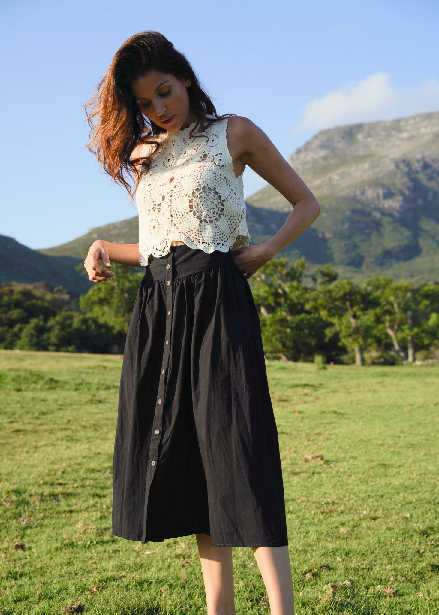 View our 3/4 Skirt with front Buttons in Black - by Tribute Store