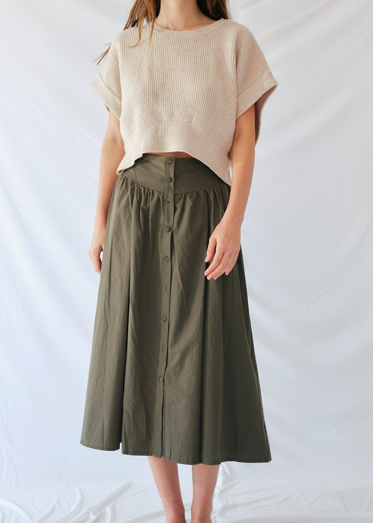 View our 3/4 Skirt with front Buttons in Khaki - by Tribute Store
