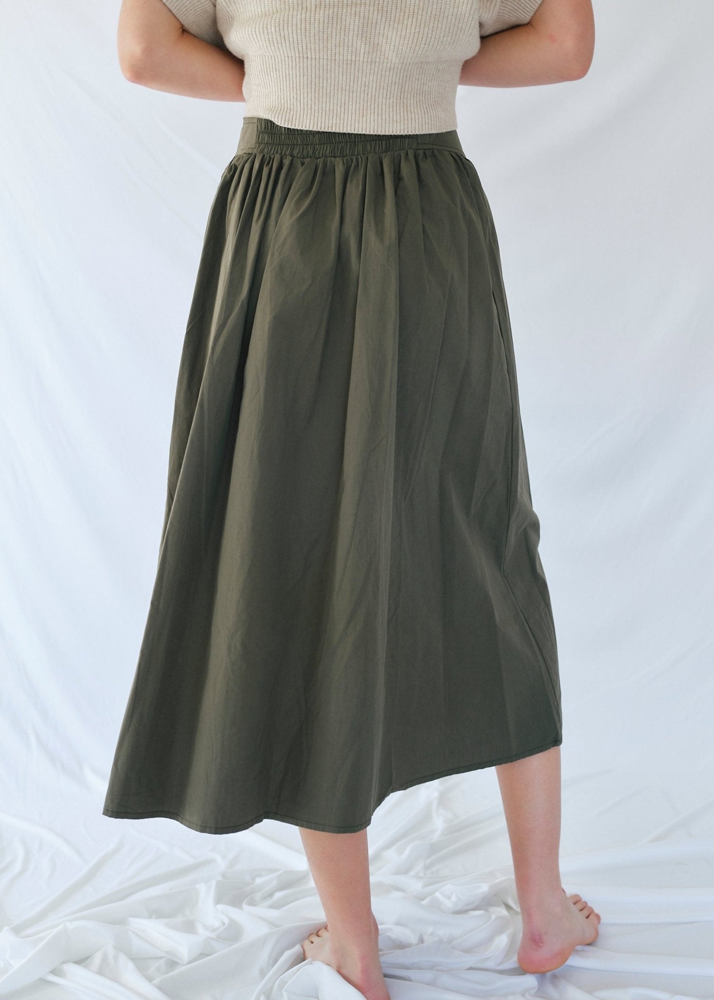 View our 3/4 Skirt with front Buttons in Khaki - by Tribute Store