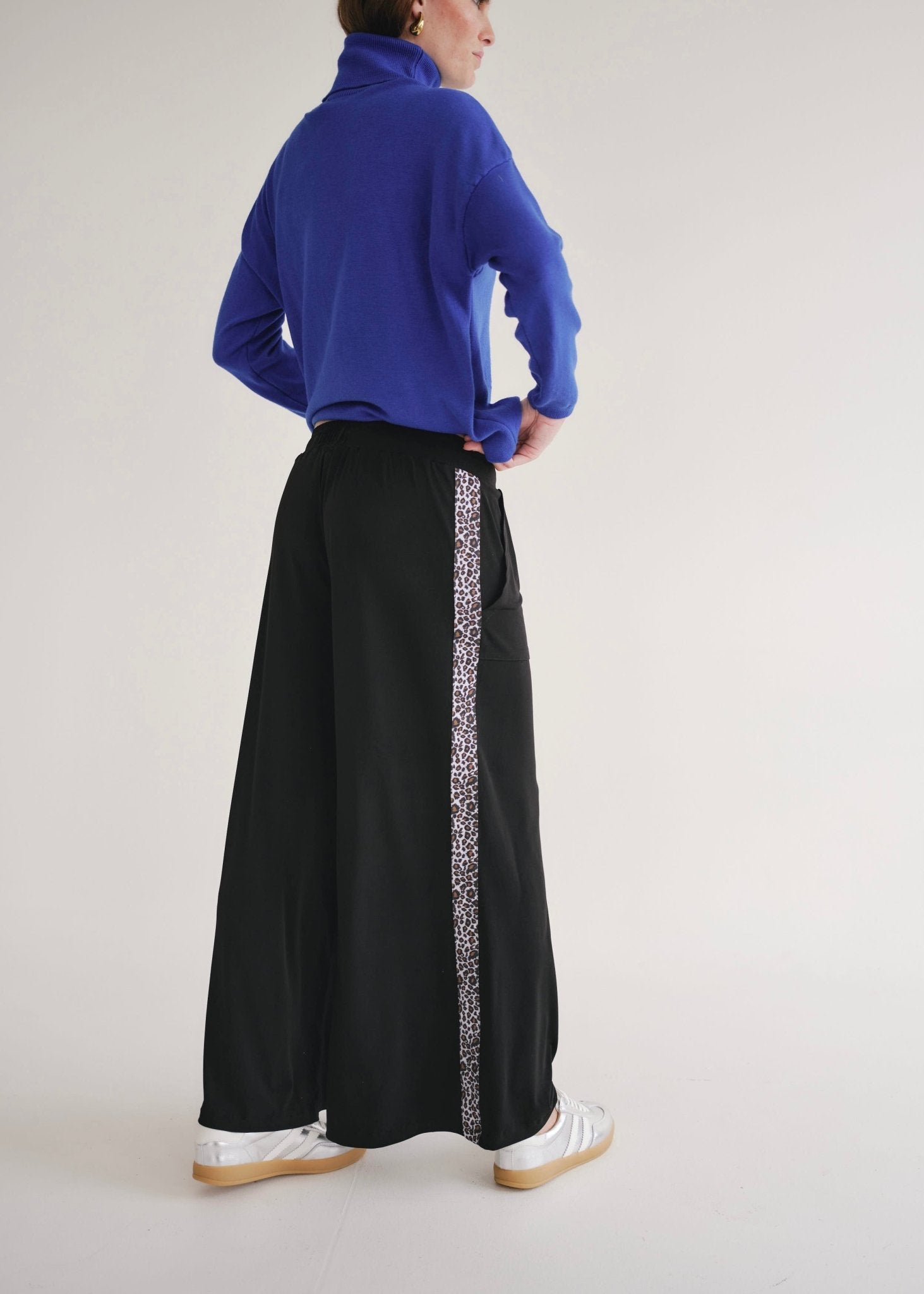 View our Alana Wide Leg Pants In Black With Animal Print - by Tribute Store