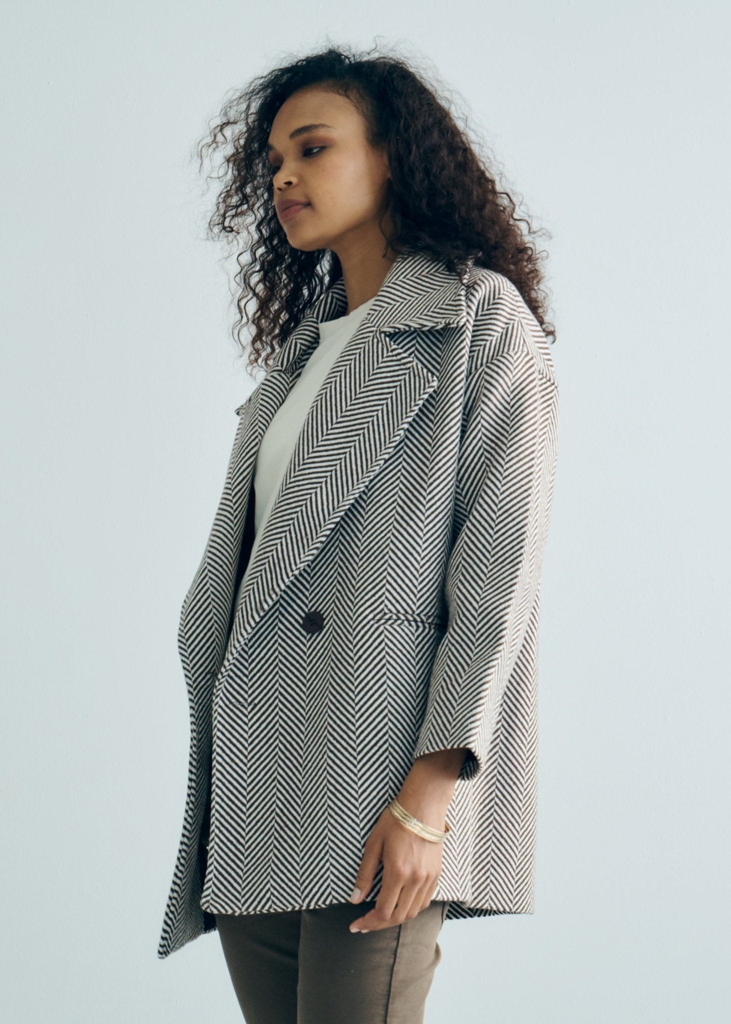 View our Bordeaux Wool Coat in Chocolate Brown and White - by Tribute Store