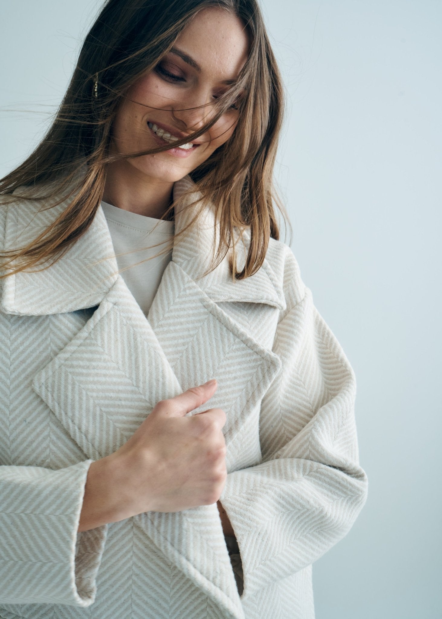 View our Bordeaux Wool Coat in Cream and White - by Tribute Store