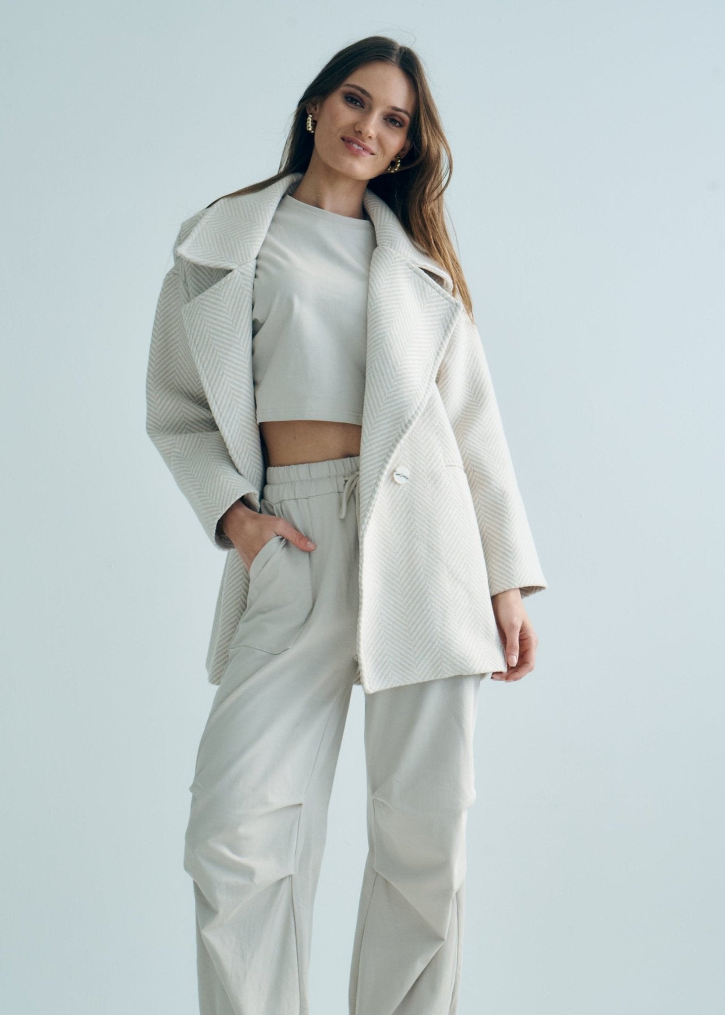 View our Bordeaux Wool Coat in Cream and White - by Tribute Store