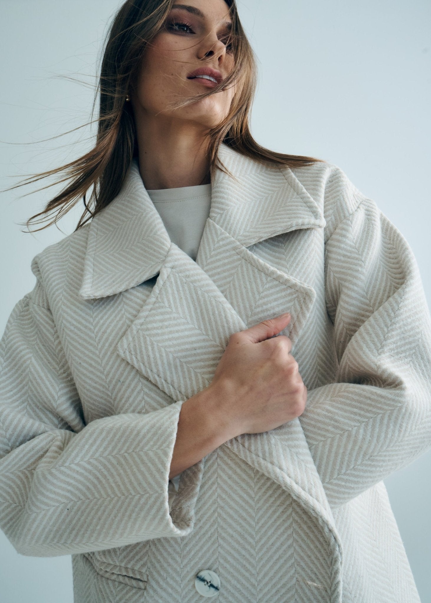 View our Bordeaux Wool Coat in Cream and White - by Tribute Store