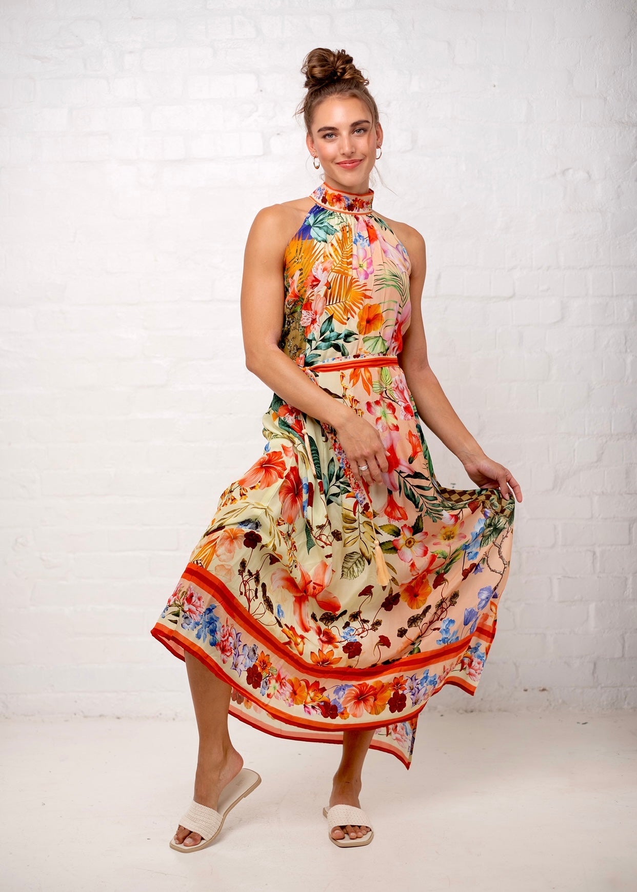 View our Brooke Dress in Peach Hibiscus - by Tribute Store