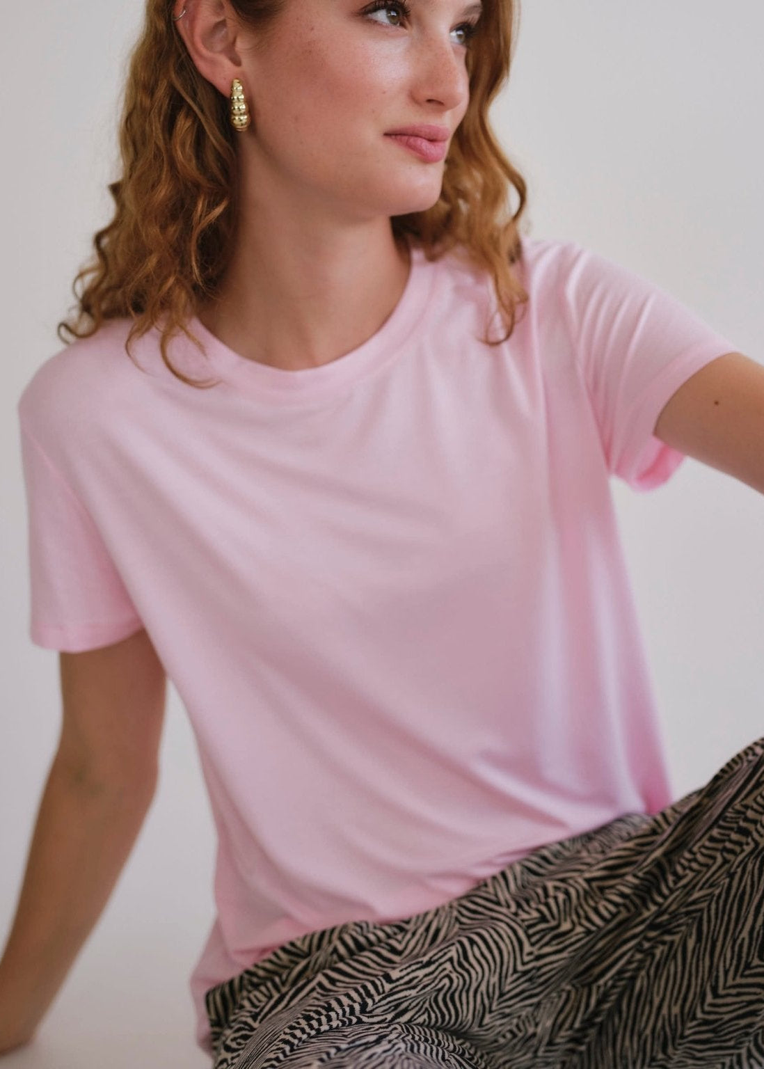 View our Butter Soft Summer Crew Neck Tee In Pink - by Tribute Store