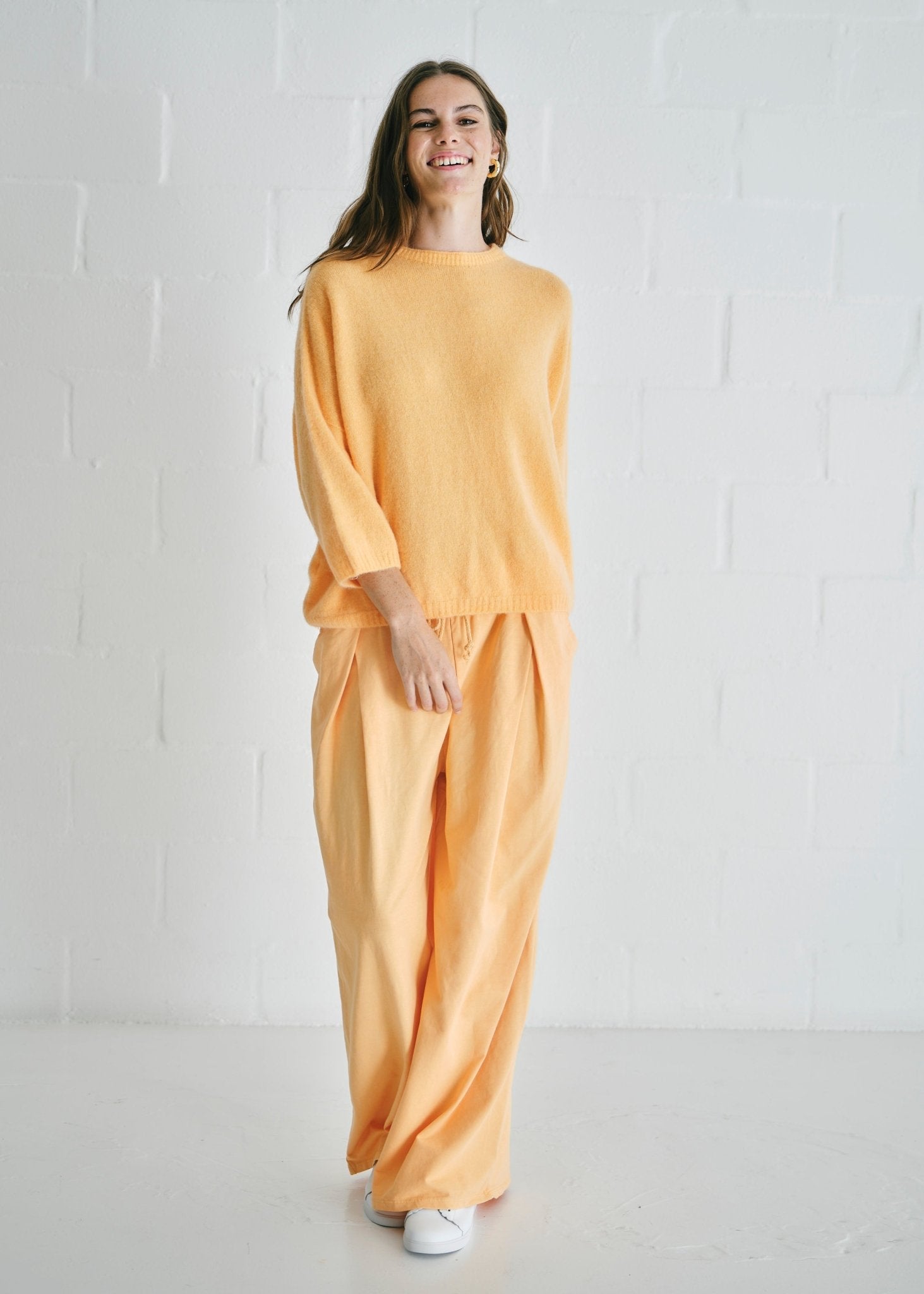 View our Calabria Italian Wide Leg Tracksuit Pants In Apricot - by Tribute Store