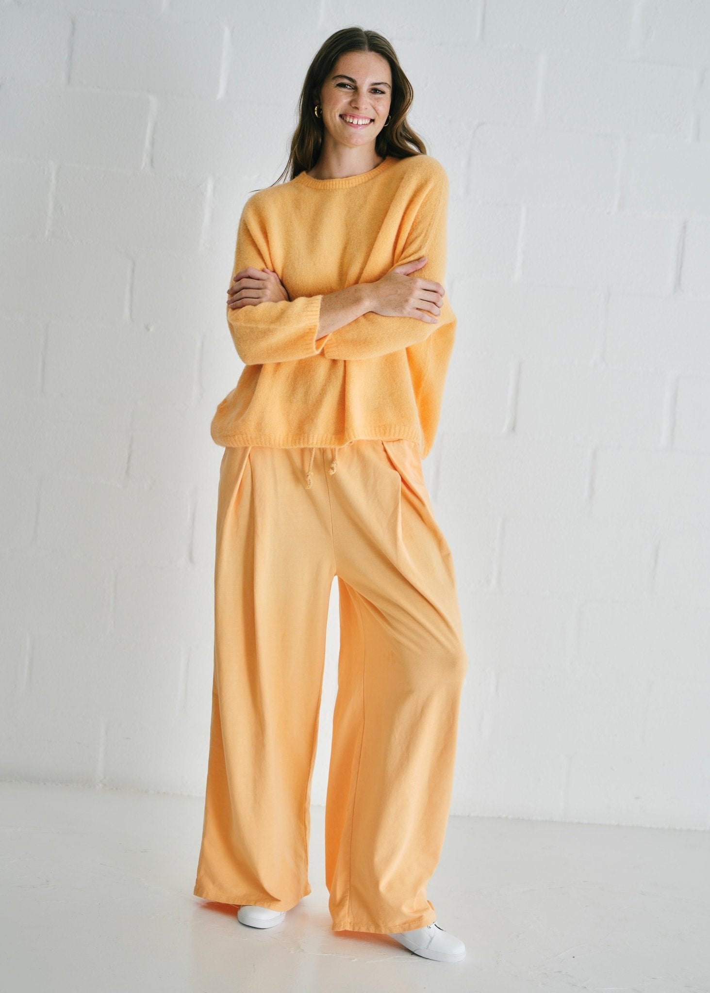 View our Calabria Italian Wide Leg Tracksuit Pants In Apricot - by Tribute Store