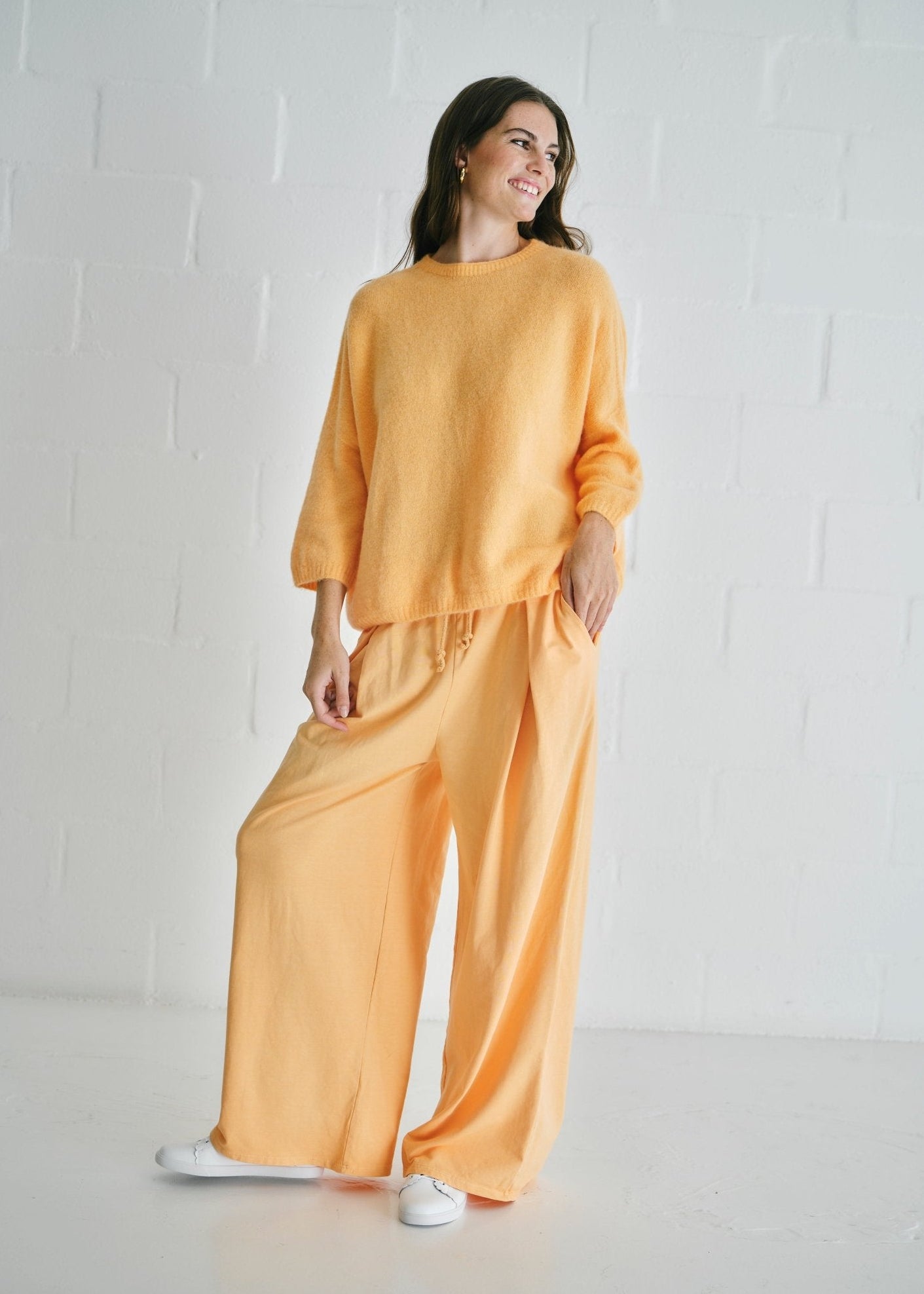 View our Calabria Italian Wide Leg Tracksuit Pants In Apricot - by Tribute Store