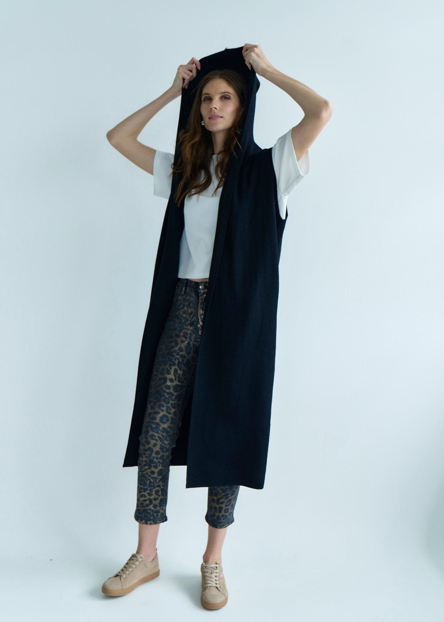 View our Camille Sleeveless Knitted Viscose Coat in Black - by Tribute Store