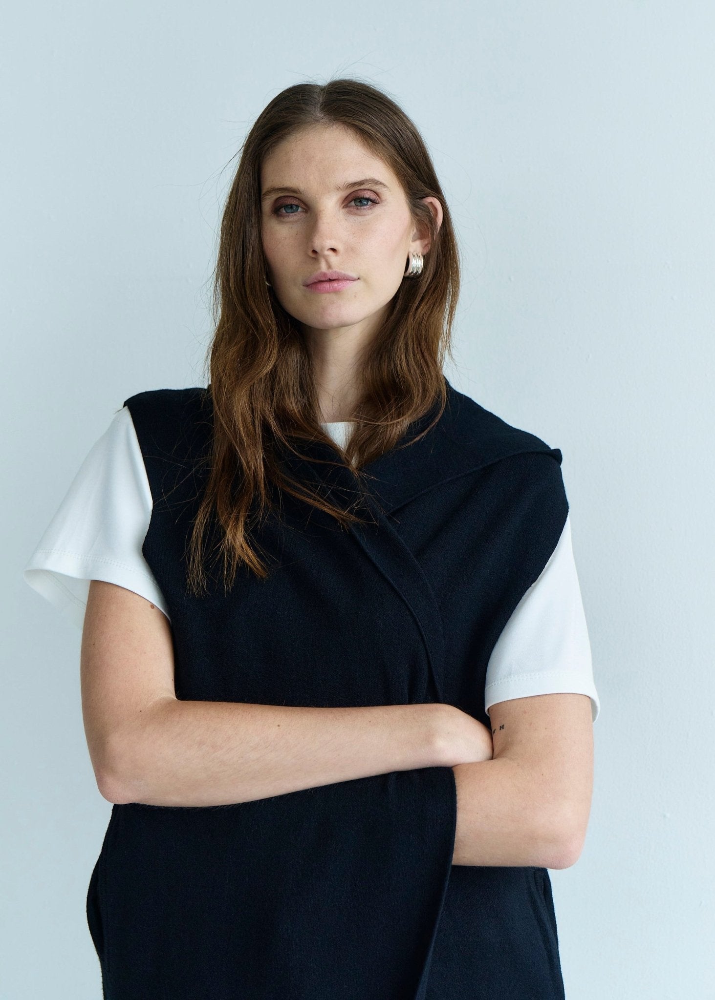 View our Camille Sleeveless Knitted Viscose Coat in Black - by Tribute Store