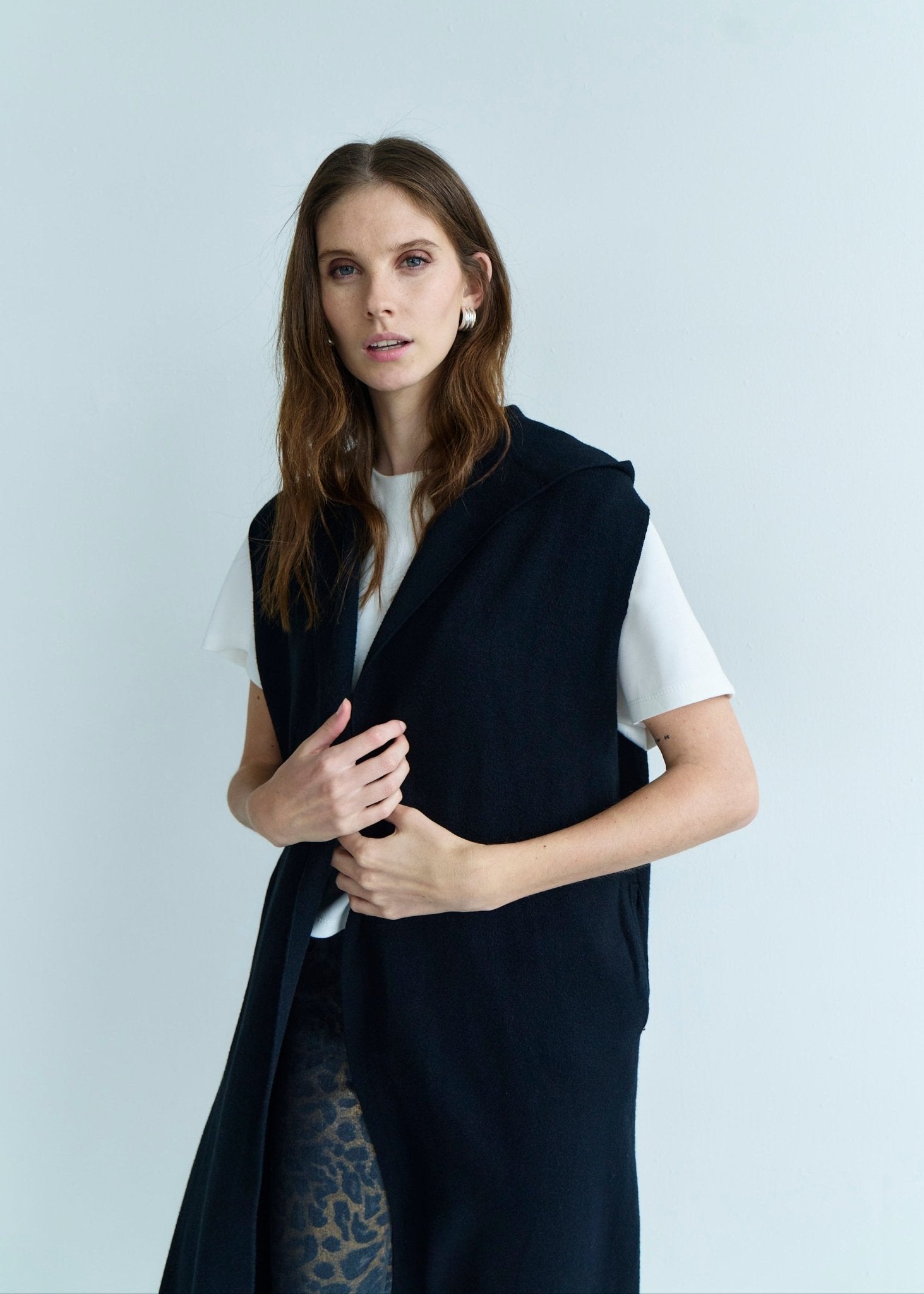 View our Camille Sleeveless Knitted Viscose Coat in Black - by Tribute Store