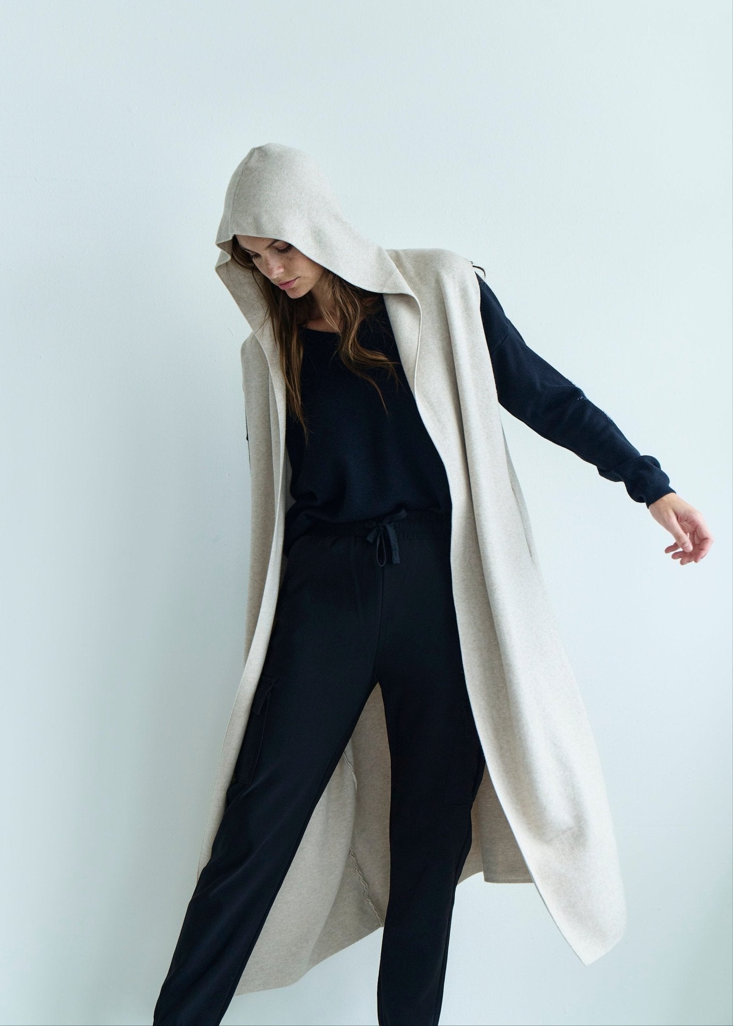 View our Camille Sleeveless Knitted Viscose Coat in Cream - by Tribute Store