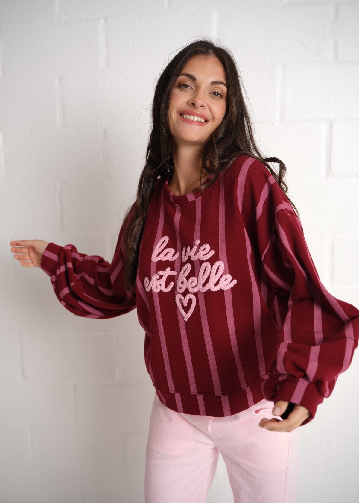 View our Cannes La Vie Est Belle Striped Sweatshirt In Burgundy Pink - by Tribute Store