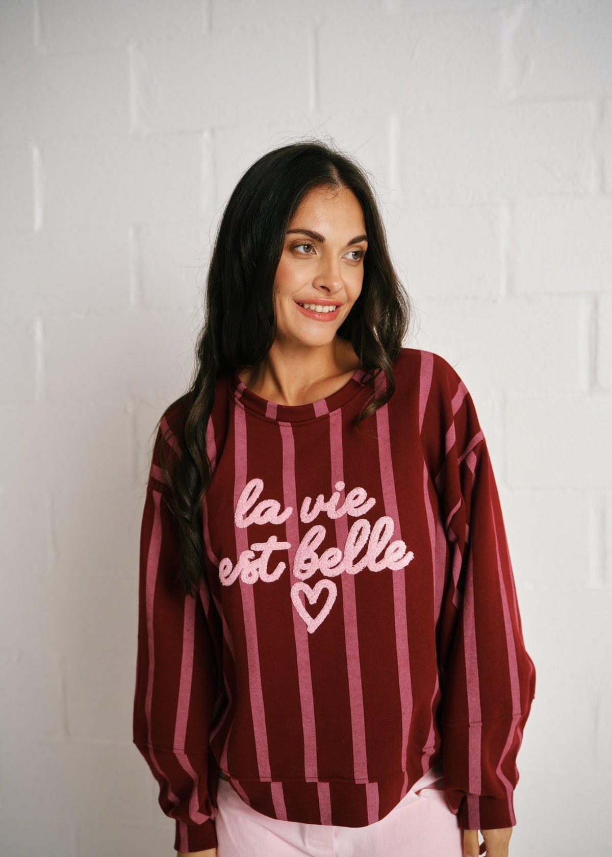 View our Cannes La Vie Est Belle Striped Sweatshirt In Burgundy Pink - by Tribute Store